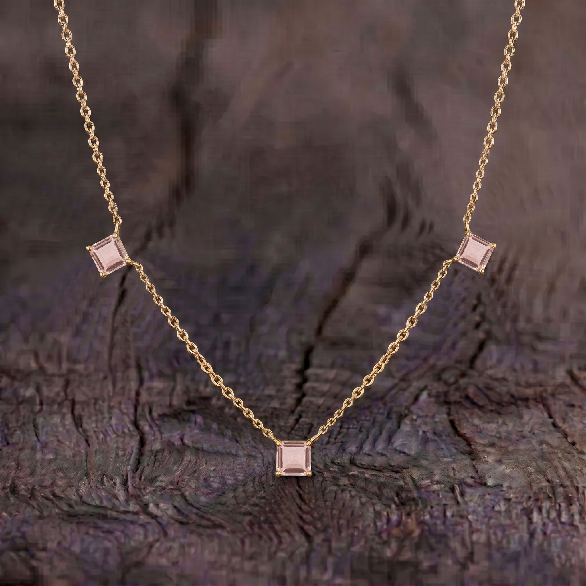 Elegant Asscher cut Morganite necklace with soft blush pink gemstones and timeless design.
