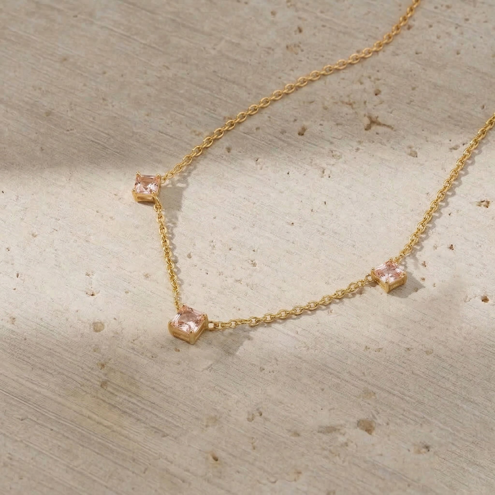 Luxury Morganite jewelry featuring three Asscher cut gemstones in sterling silver.
