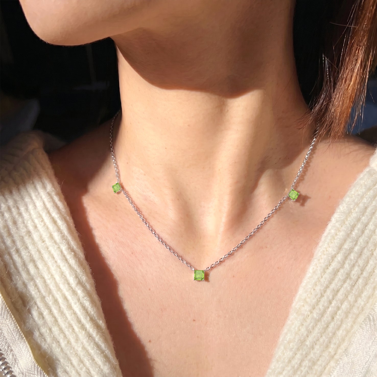 Beautiful August birthstone necklace with Peridot stones and elegant three station design.
