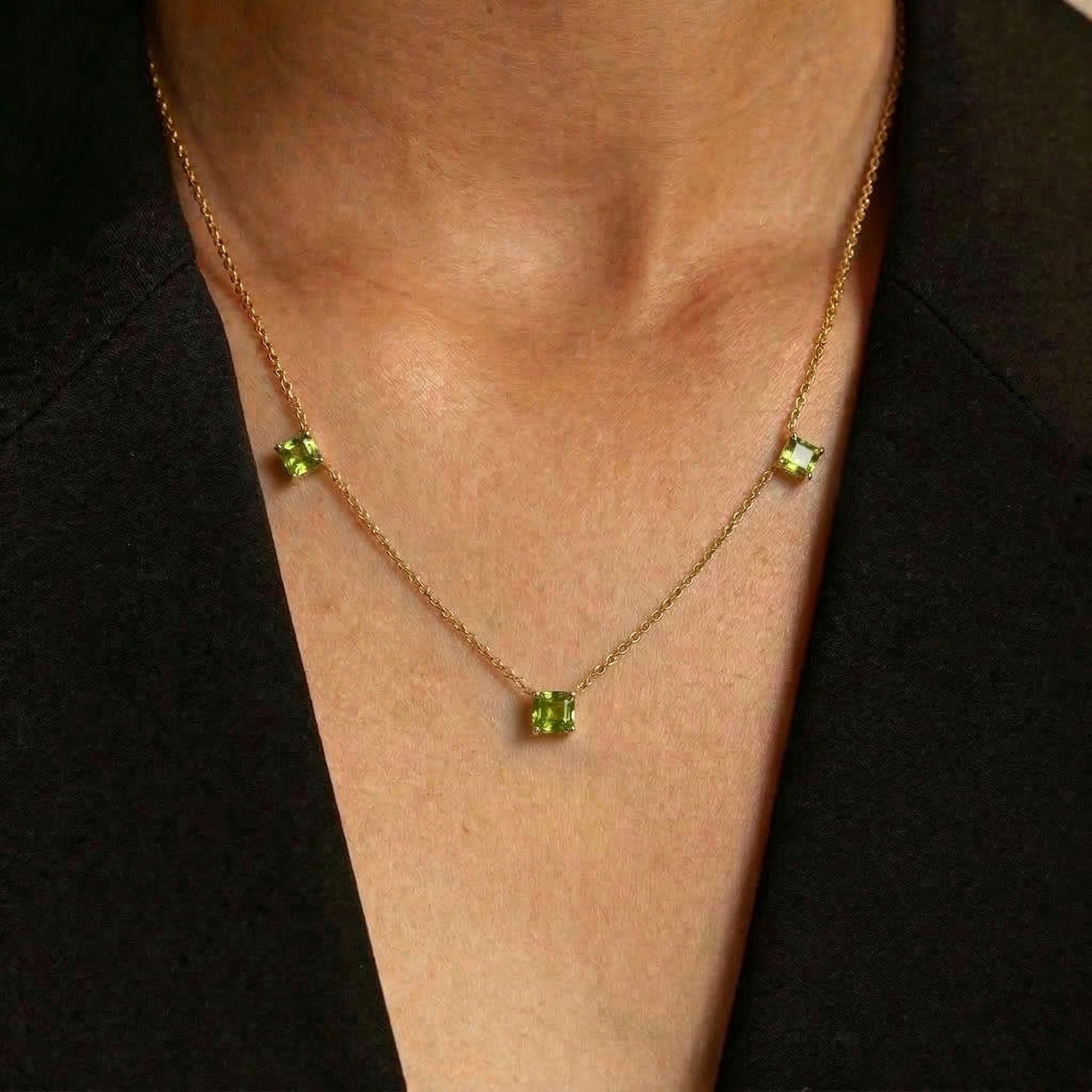 Luxury Asscher cut Peridot necklace with three gemstones for women.
