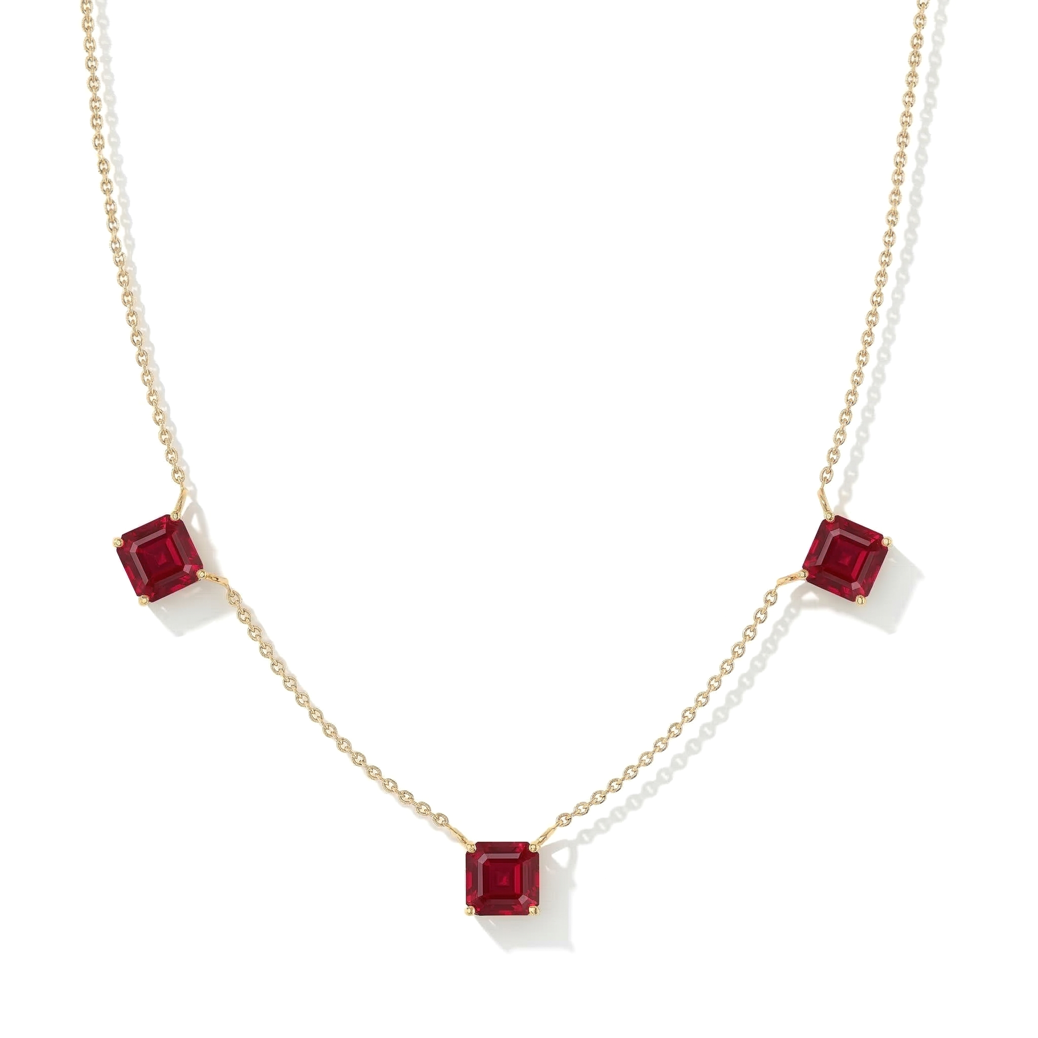 Elegant Asscher cut Ruby necklace with three gemstones for fine jewelry lovers.
