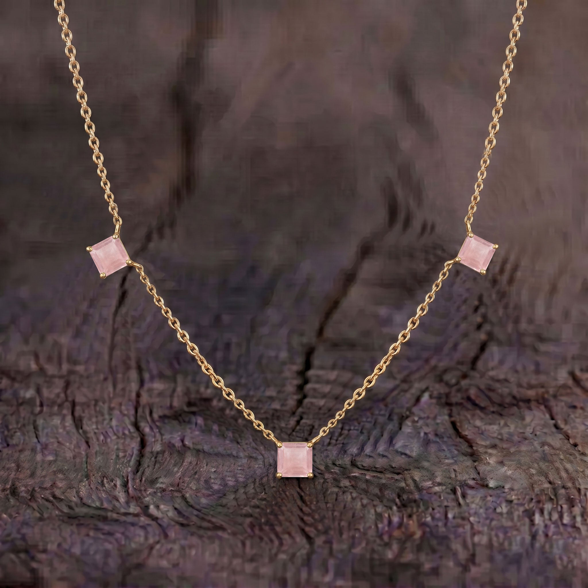 January birthstone Rose Quartz necklace with elegant three stone design for women.
