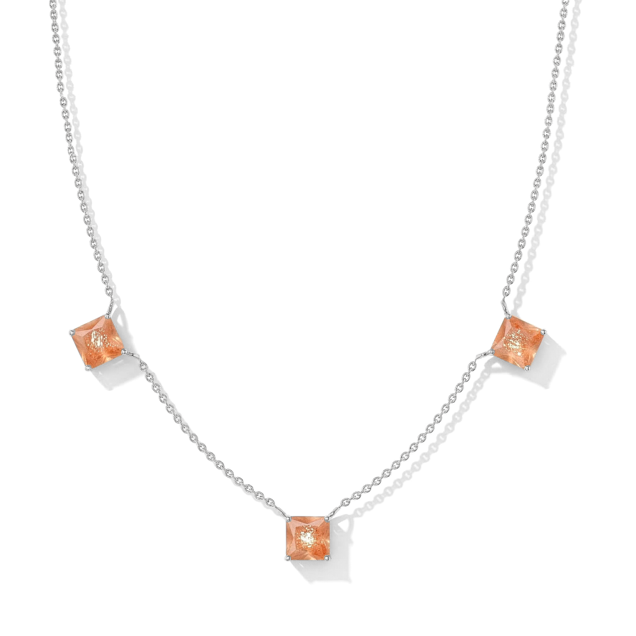 "Sunstone Asscher cut station necklace in yellow gold filled and 925 sterling silver featuring three gemstones.
