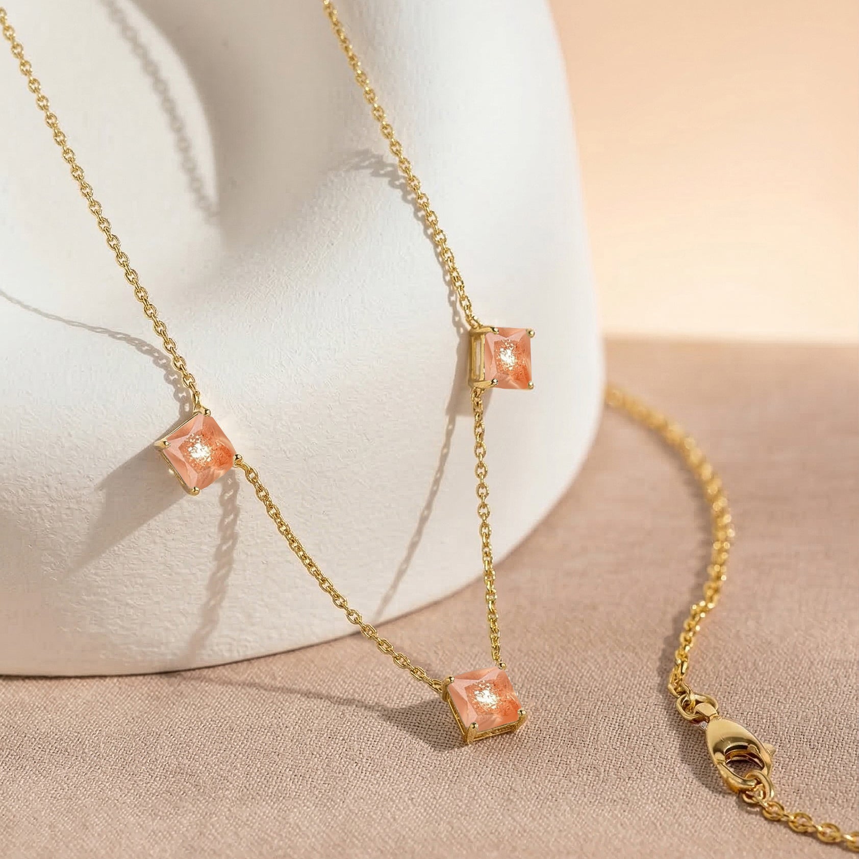 Fine gemstone Sunstone necklace featuring Asscher cut stones for layering and special occasions.
