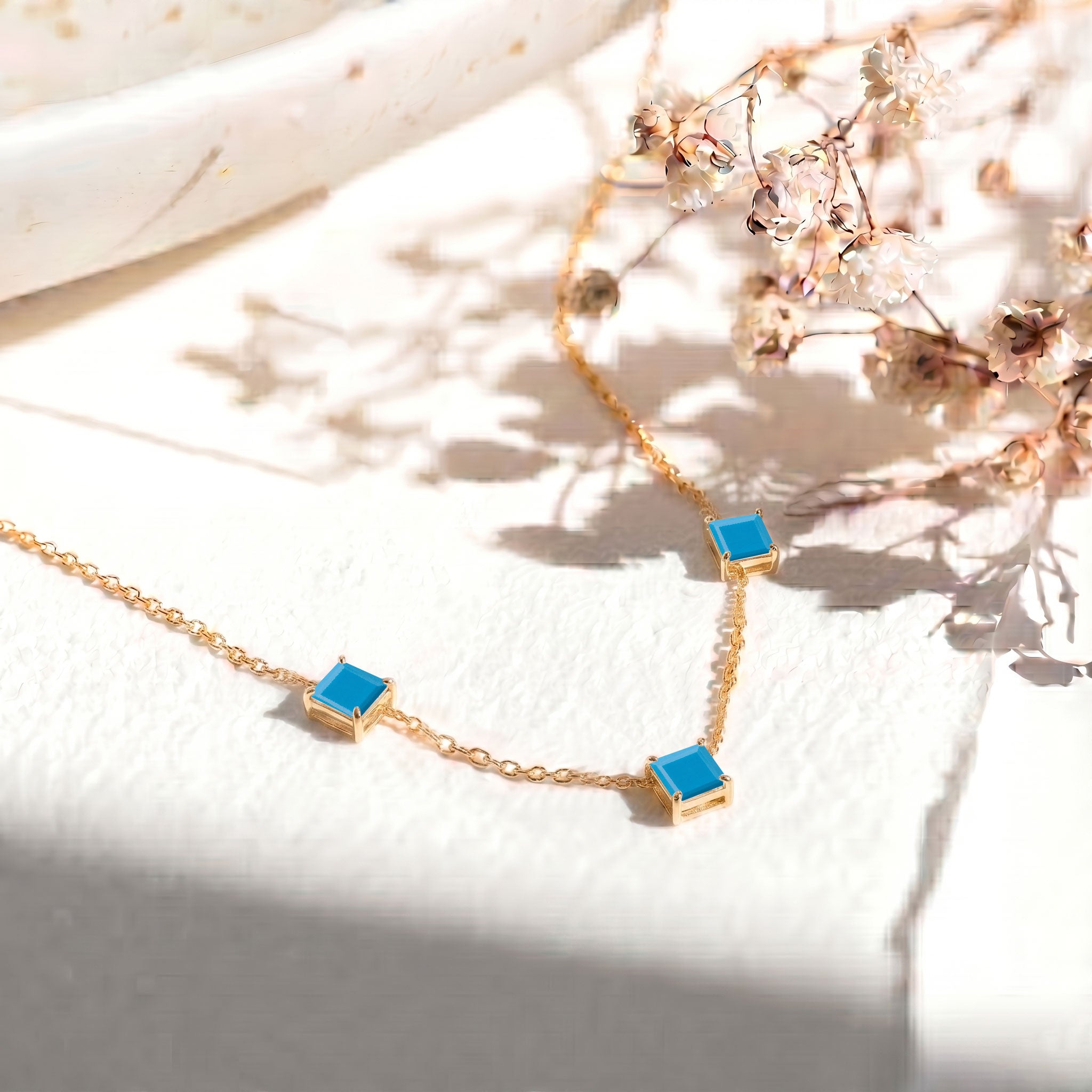 Dainty Turquoise gemstone necklace with blue green stones and yellow gold filled finish.
