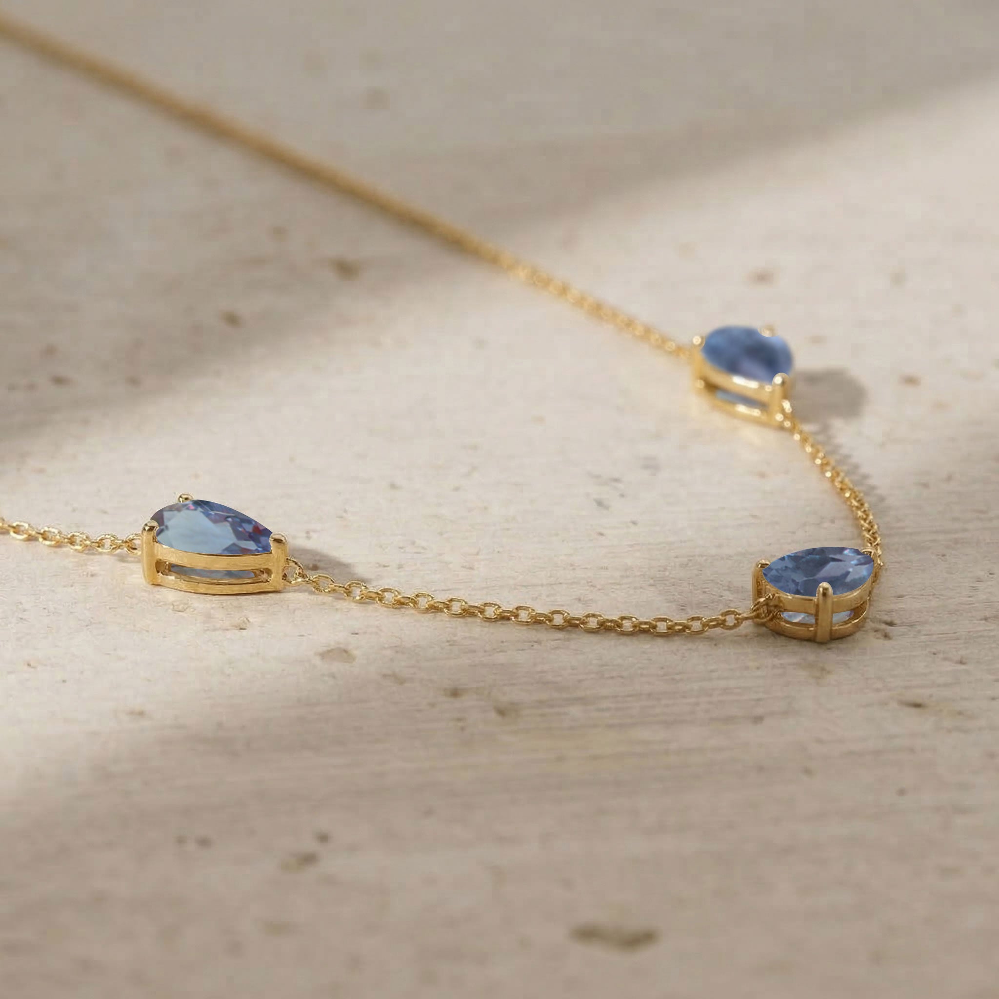 Minimalist Alexandrite three stone station necklace.
