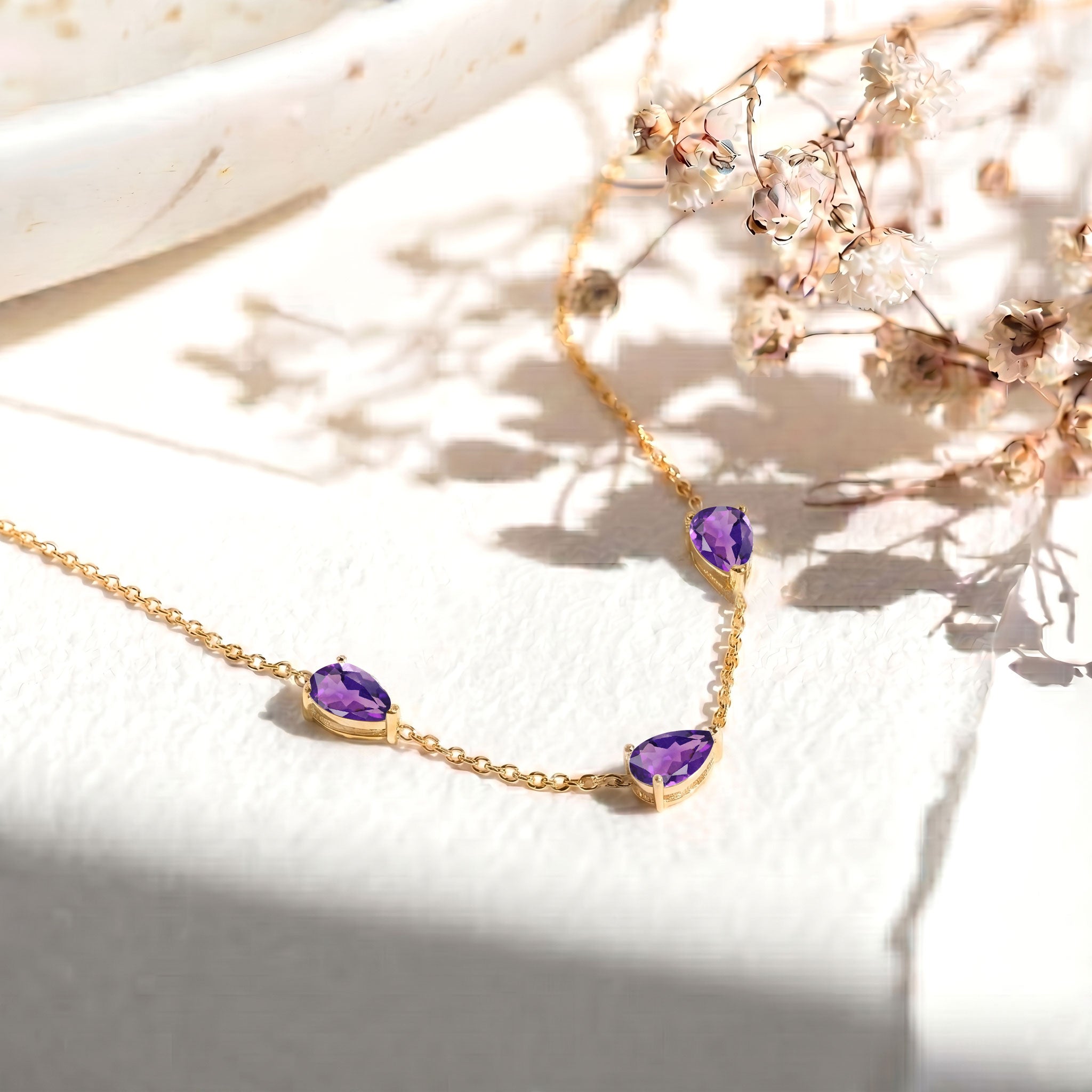 Natural Amethyst gemstone necklace in sterling silver.
