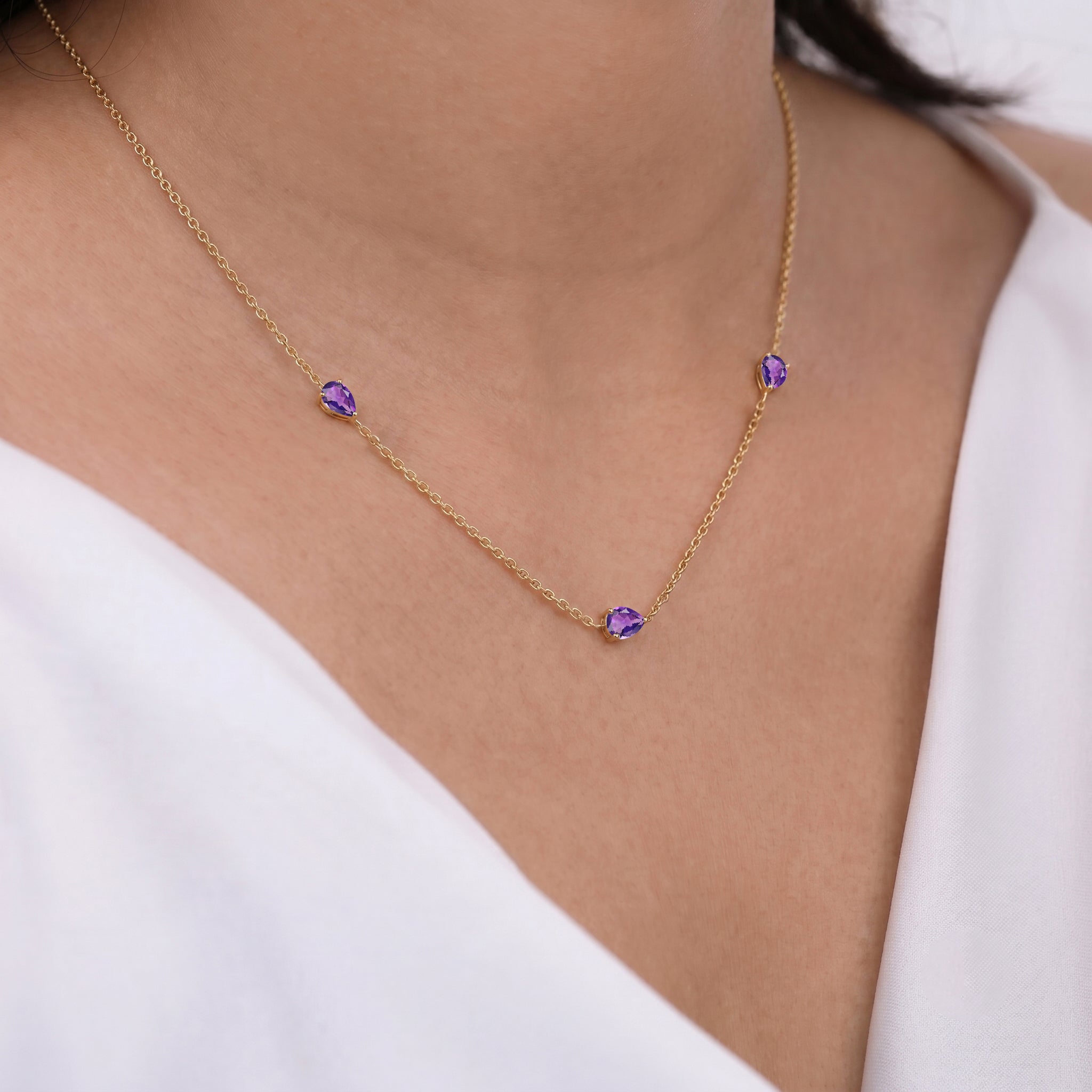 Luxury Amethyst station necklace with genuine gemstones.
