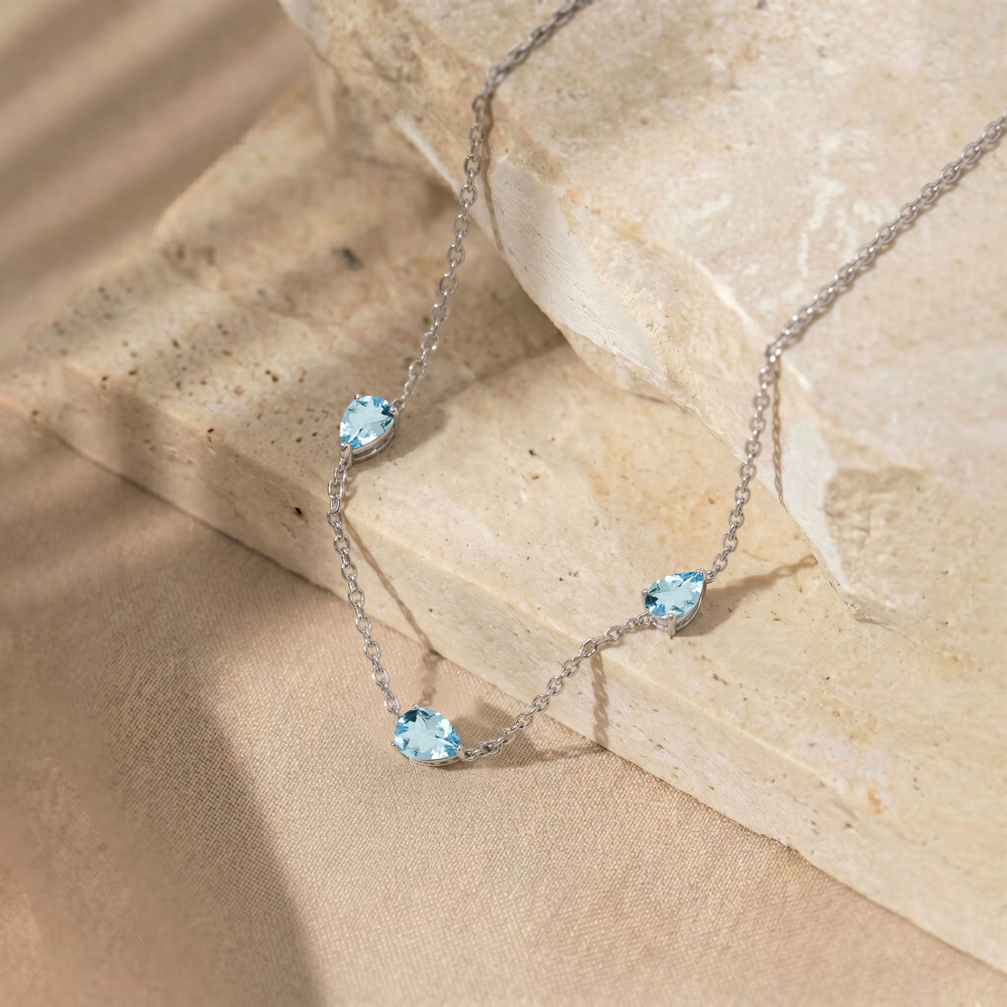 Minimalist Aquamarine three stone station necklace for everyday wear
