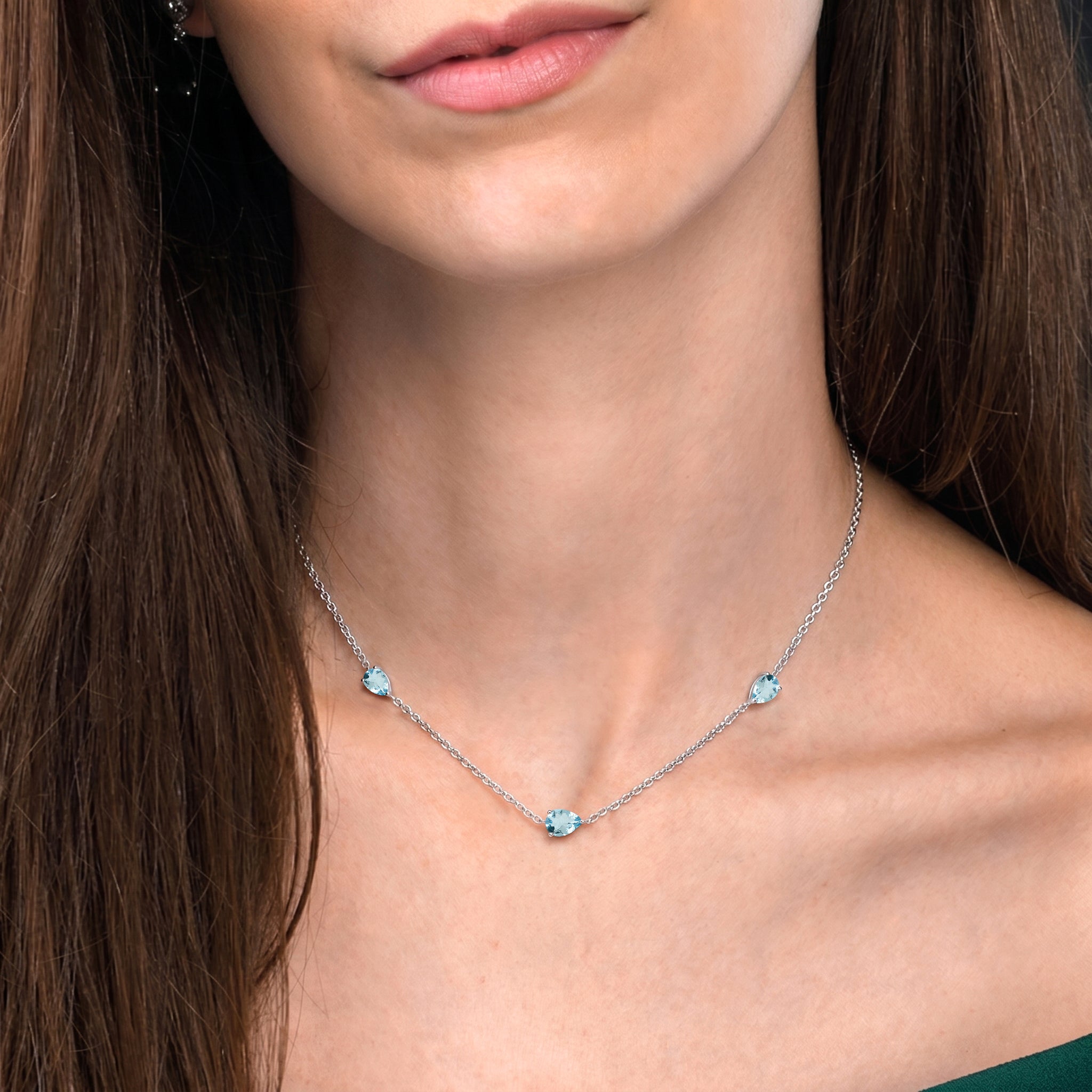 Elegant Aquamarine gemstone necklace for women with three pear cut stones
