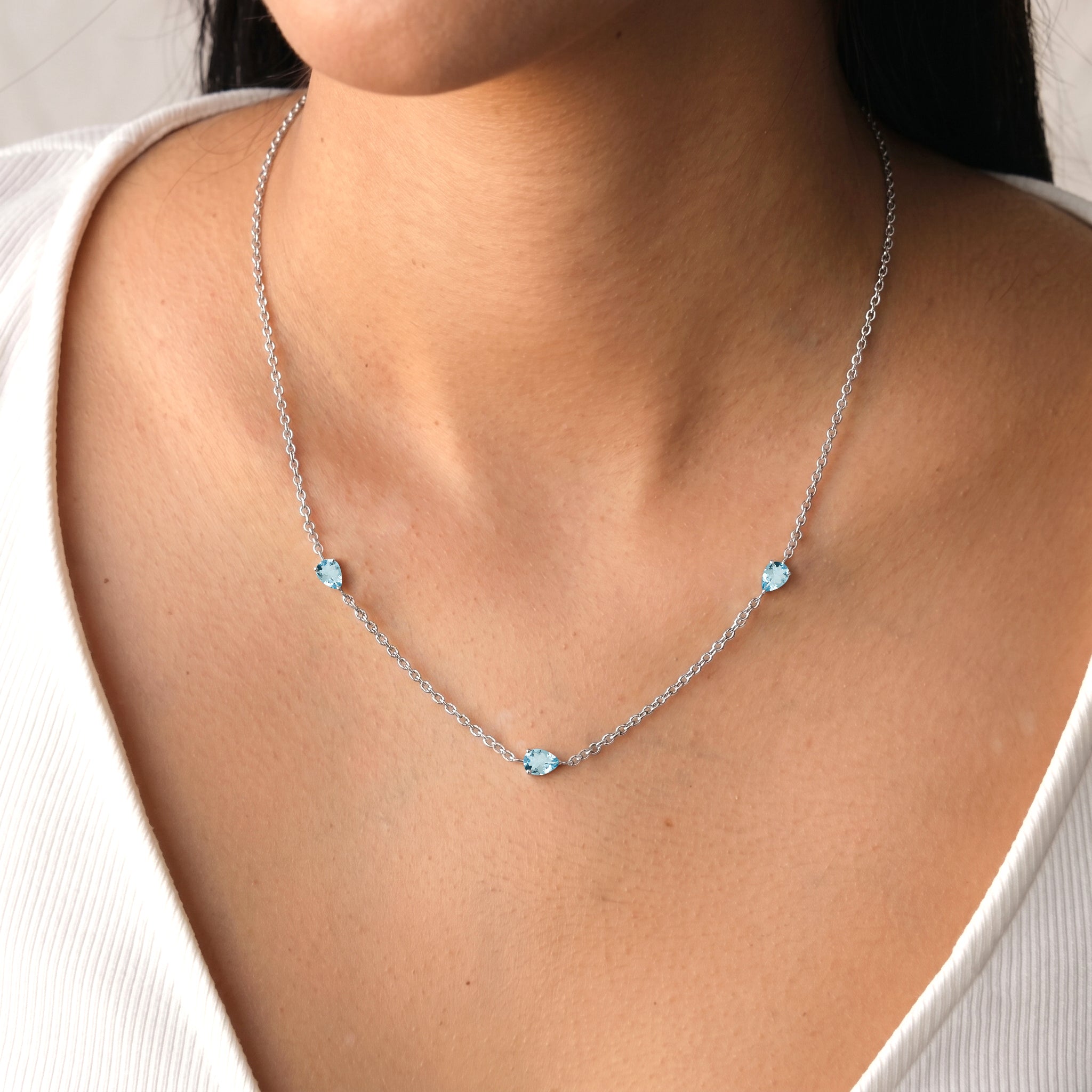 Fine gemstone jewelry featuring genuine Aquamarine pear cut stones
