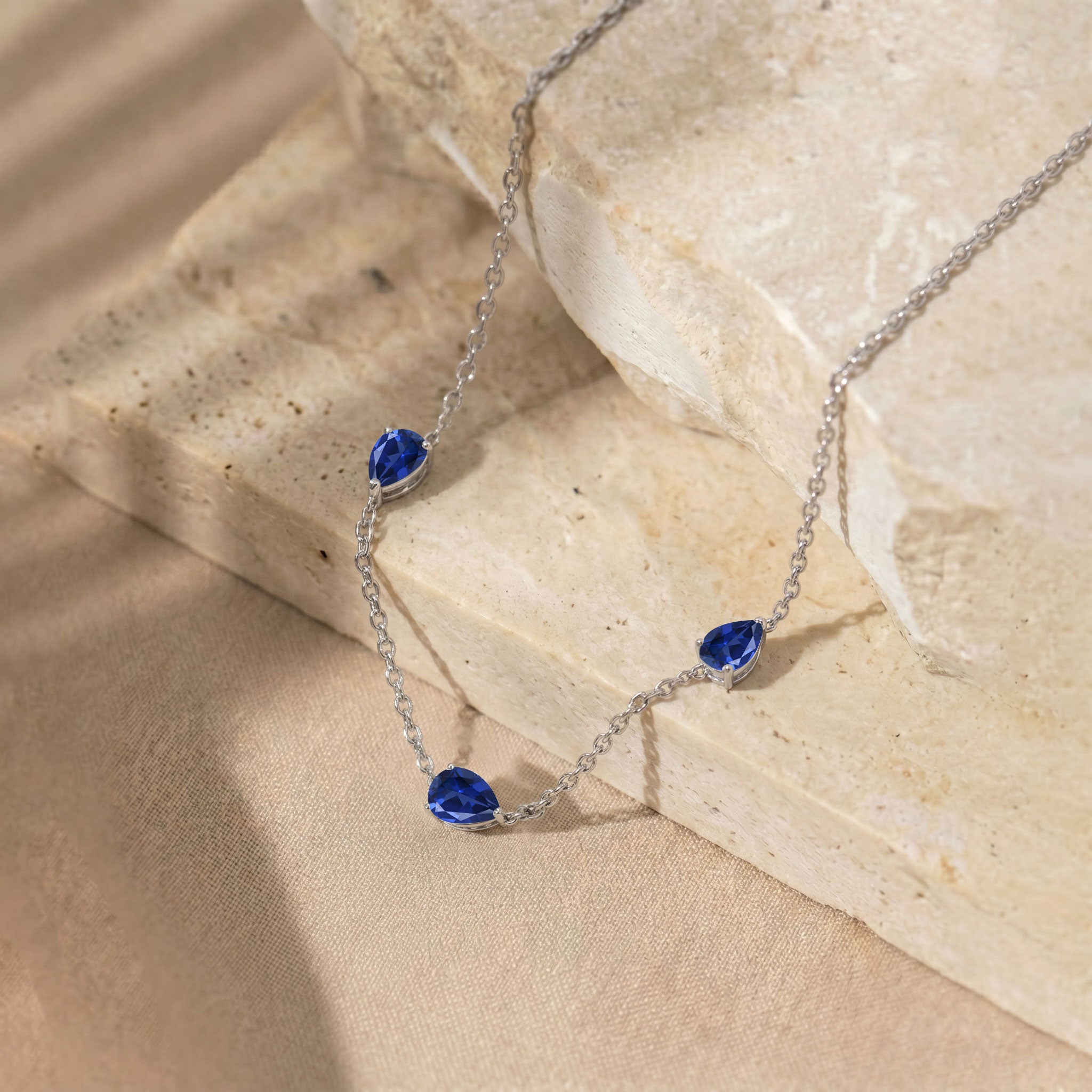 Yellow gold filled Blue Sapphire necklace with three pear cut stones

