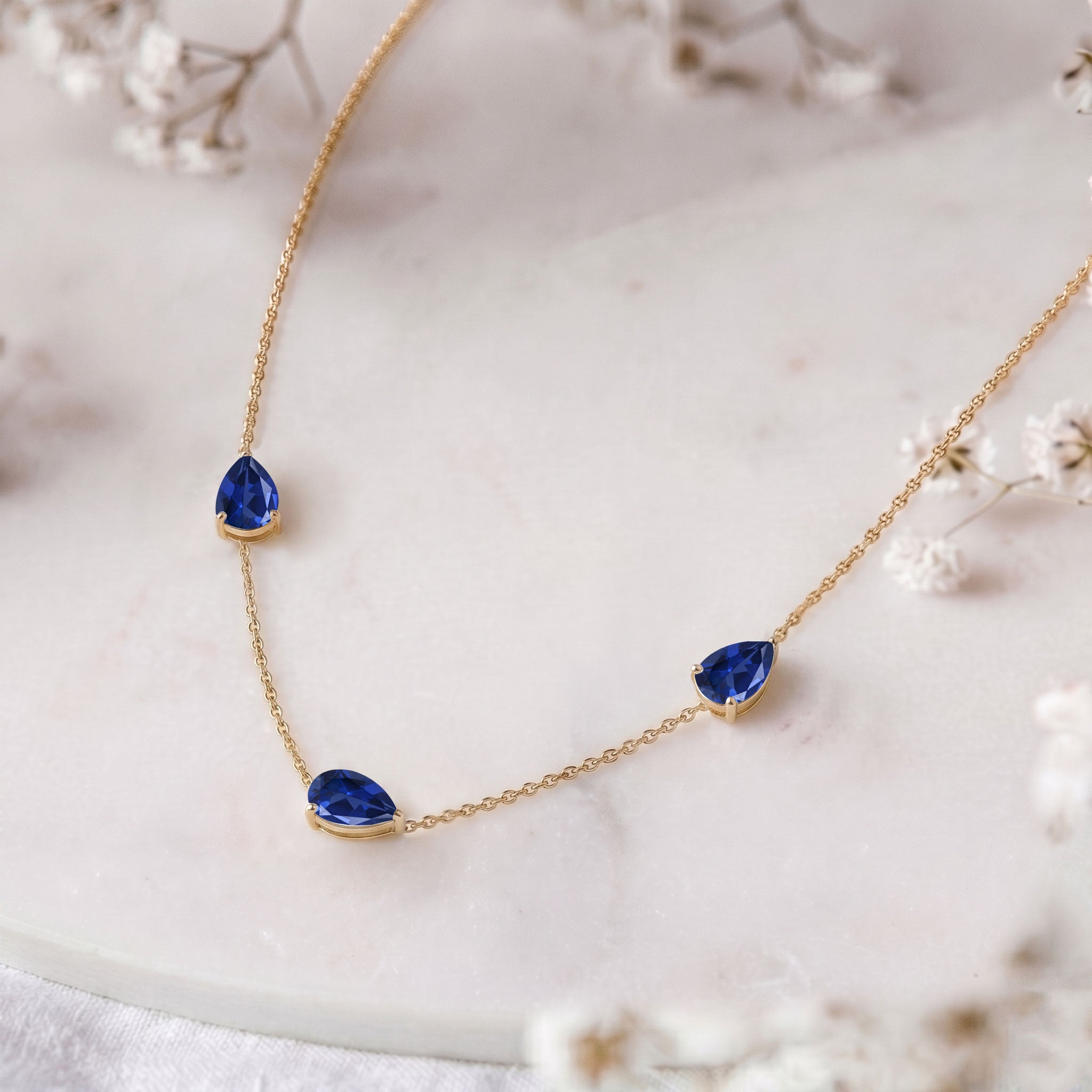 Close up of genuine Blue Sapphire pear cut gemstones
