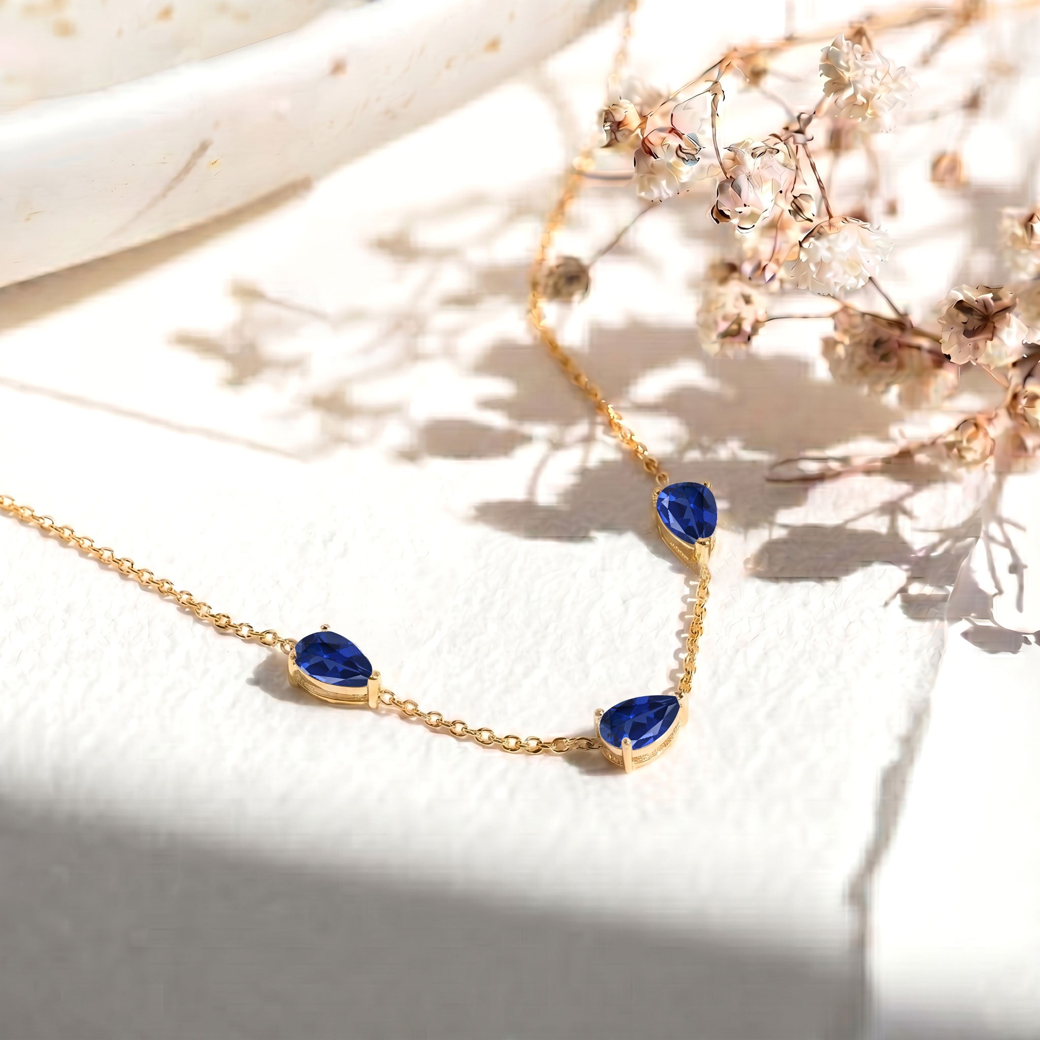 Fine jewelry Blue Sapphire necklace in sterling silver setting

