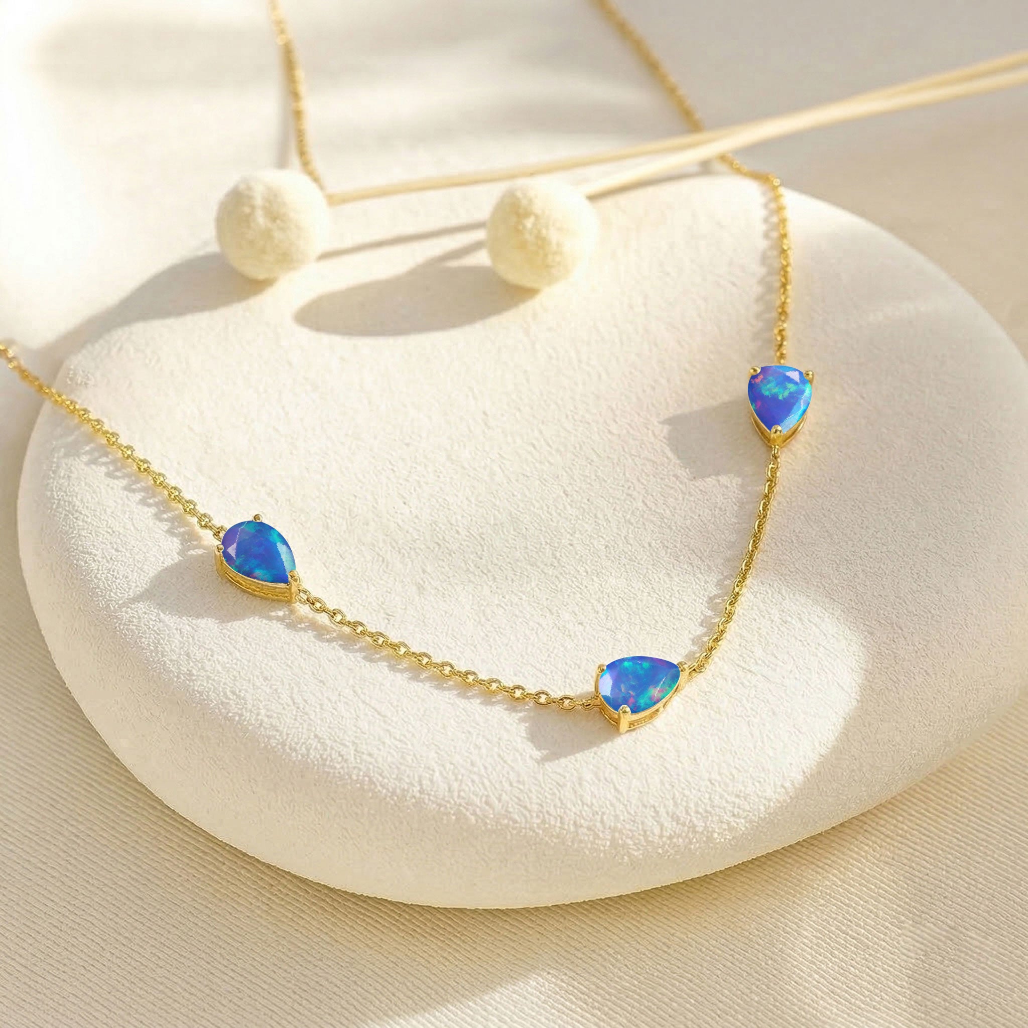 Yellow gold filled Blue Opal necklace with three pear cut stones
