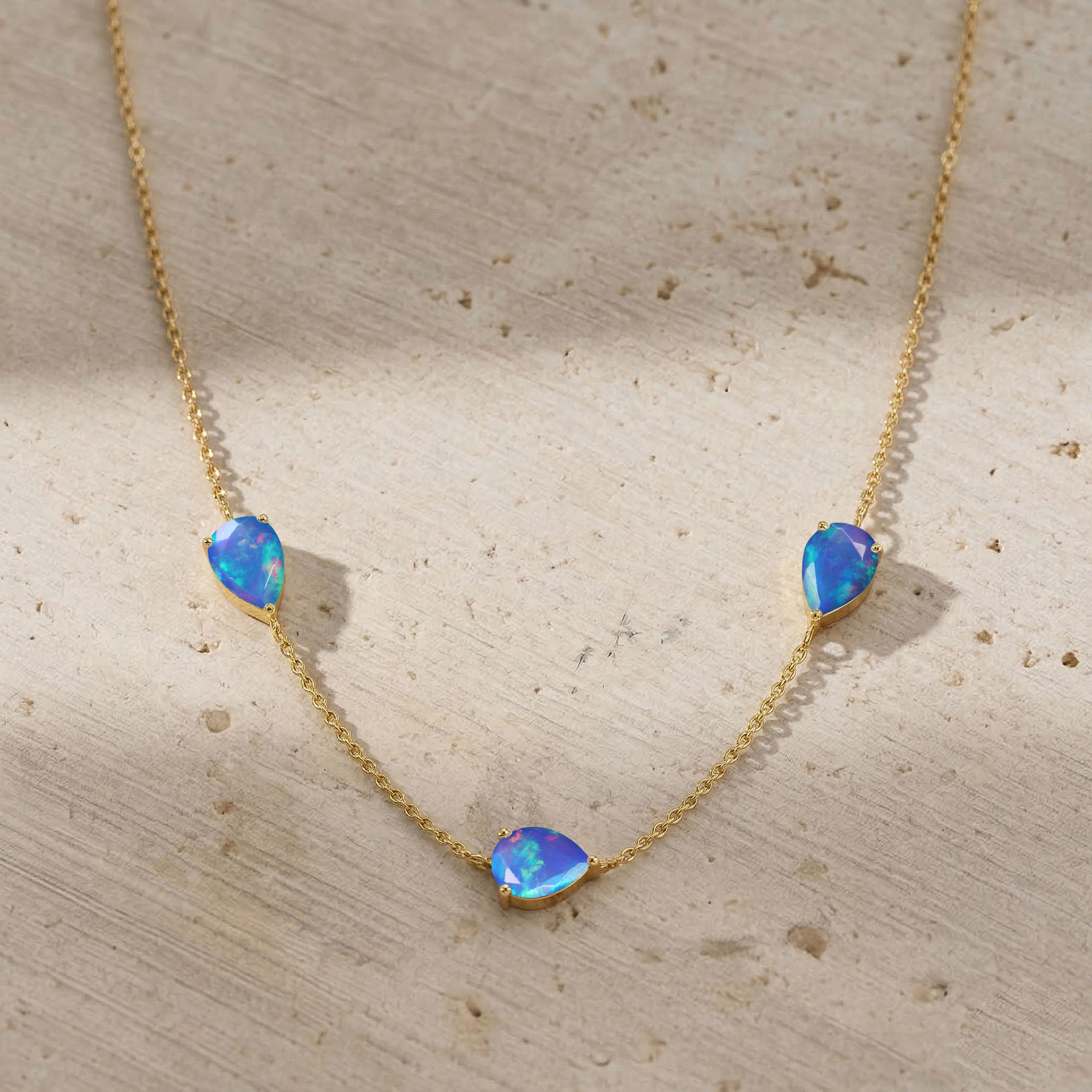Blue Opal necklace with colorful gemstone sparkle and three stone design
