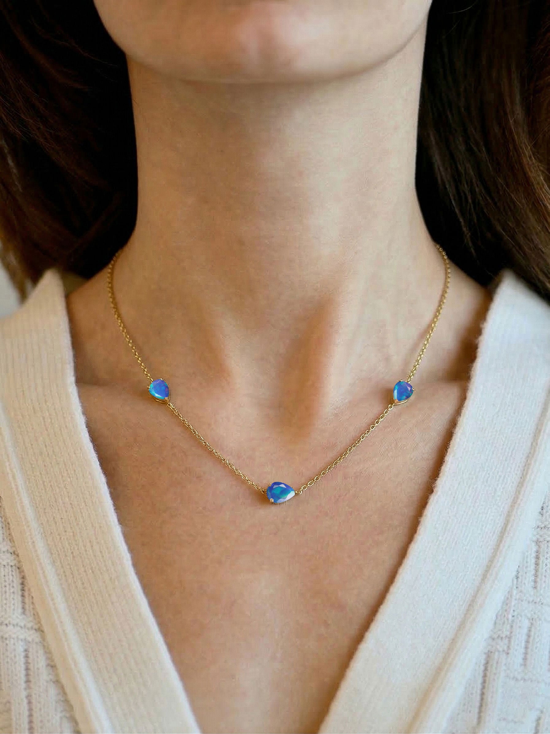 Blue Opal three stone necklace featuring October birthstone gemstones
