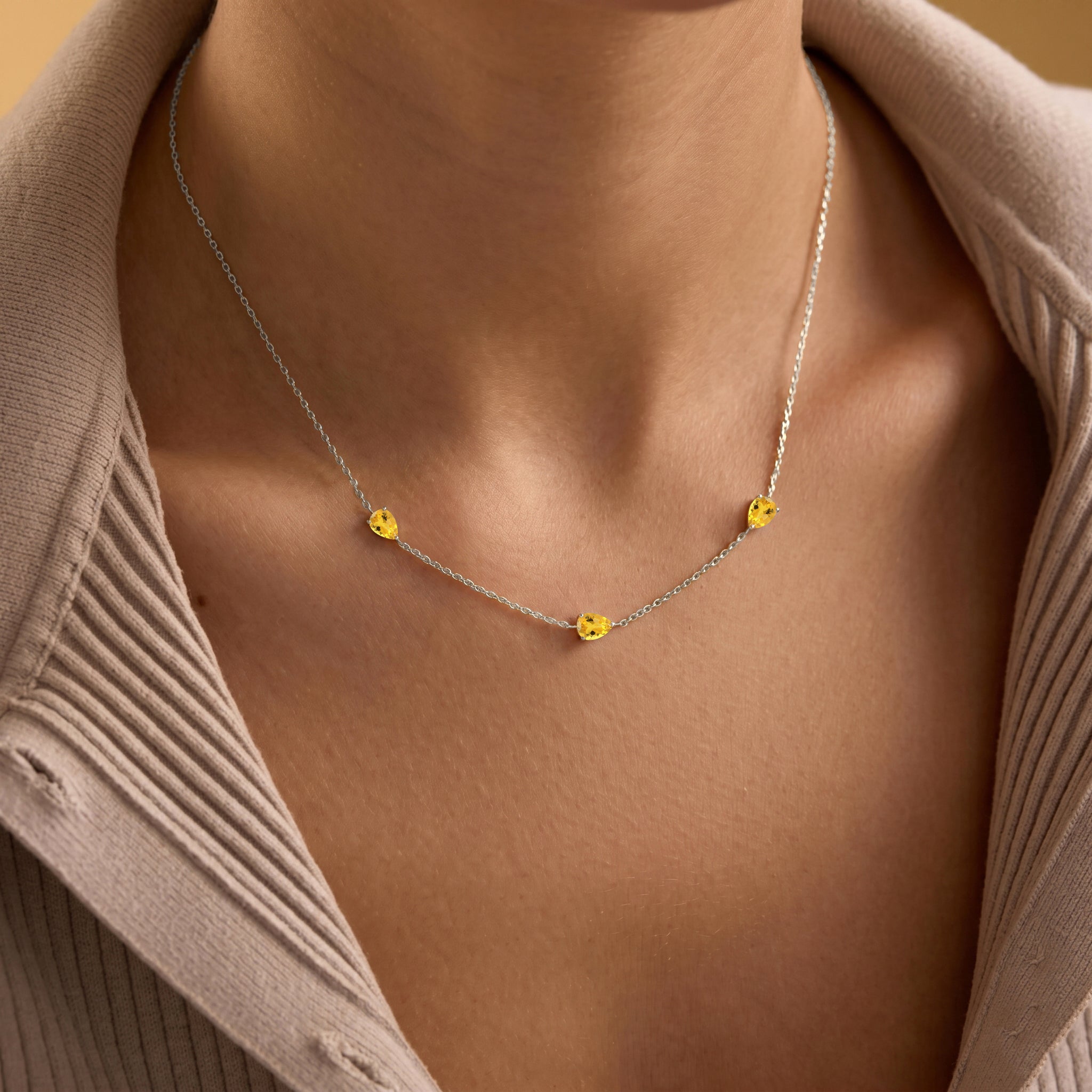 Citrine three stone necklace featuring November birthstone gemstones
