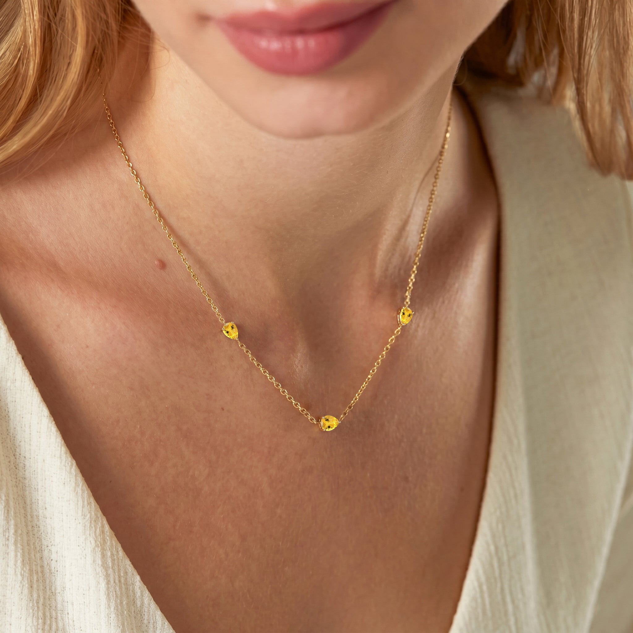 Luxury Citrine necklace with three stone design
