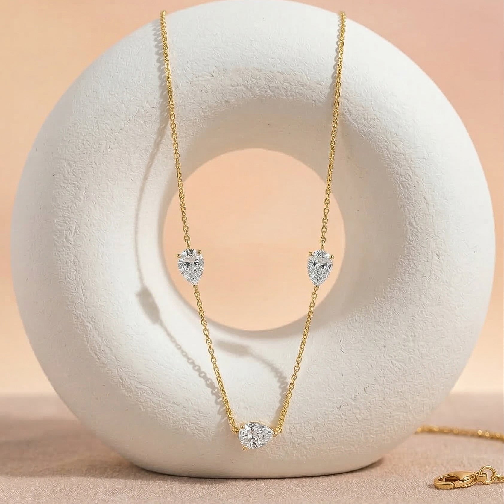 Close up of pear cut Moissanite gemstones
