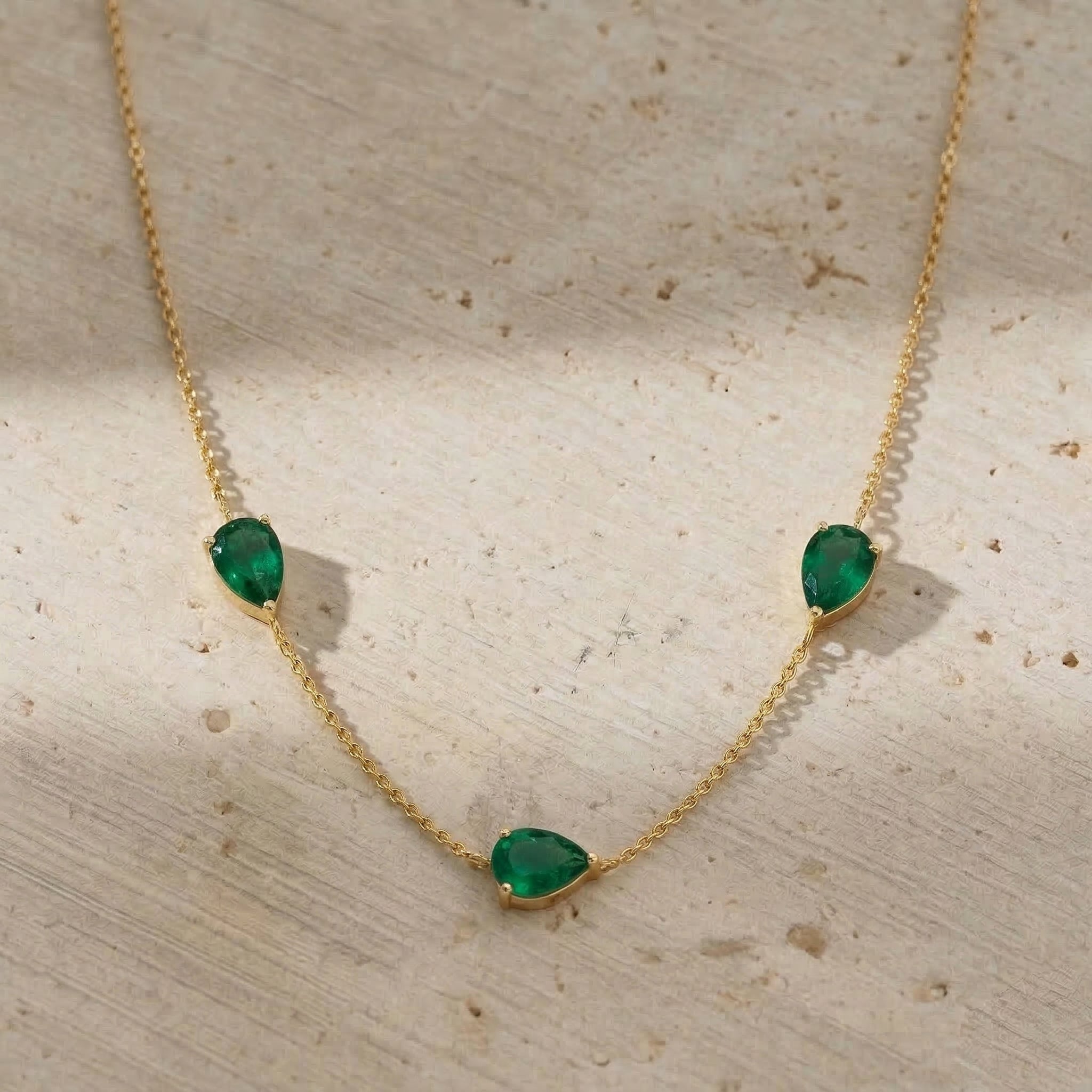 Emerald gemstone necklace with yellow gold filled finish
