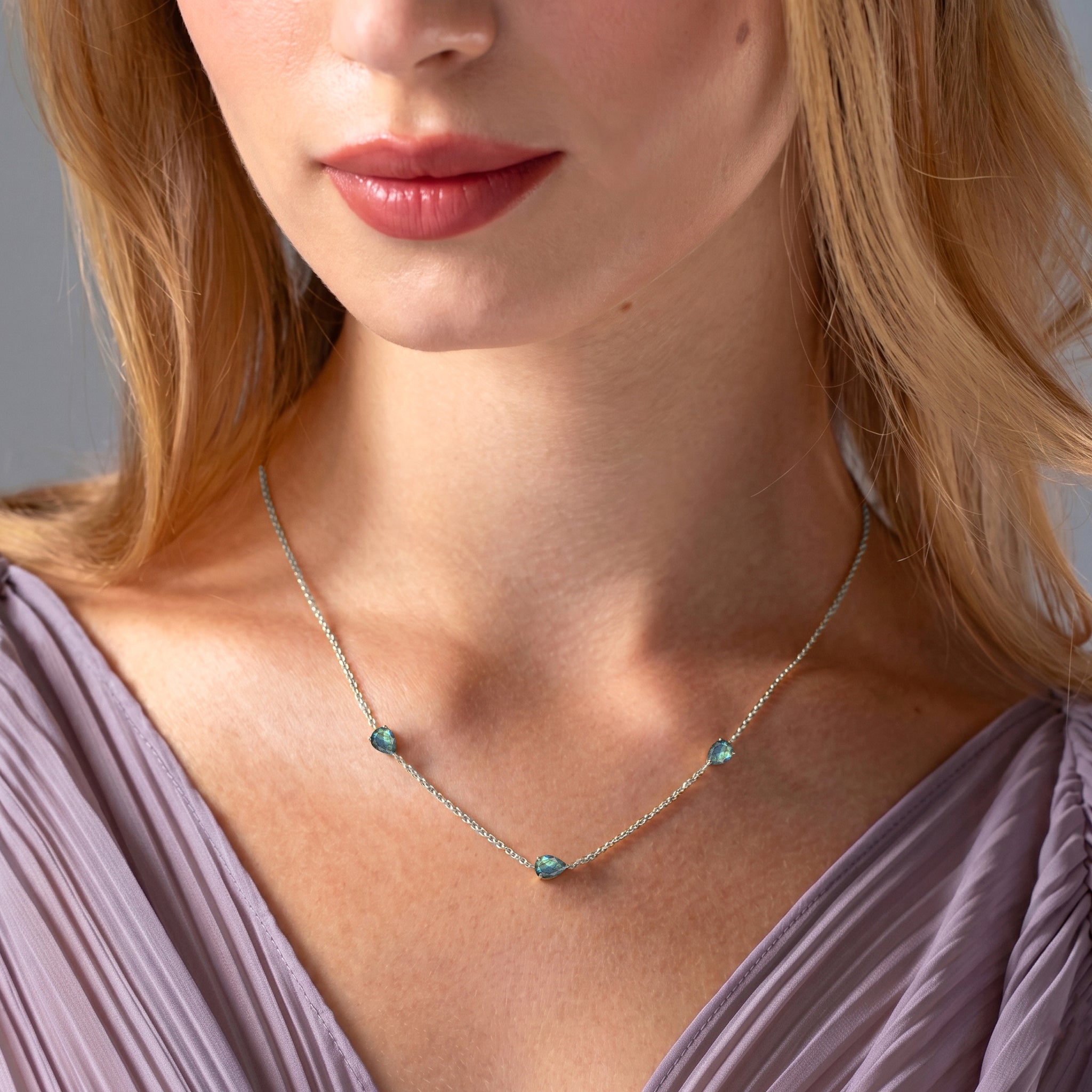 Close up of genuine Labradorite pear cut gemstones
