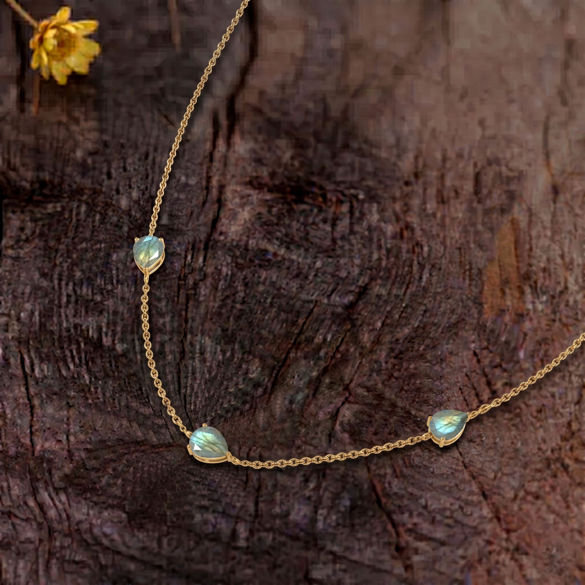 Fine jewelry Blue Topaz necklace in sterling silver setting
