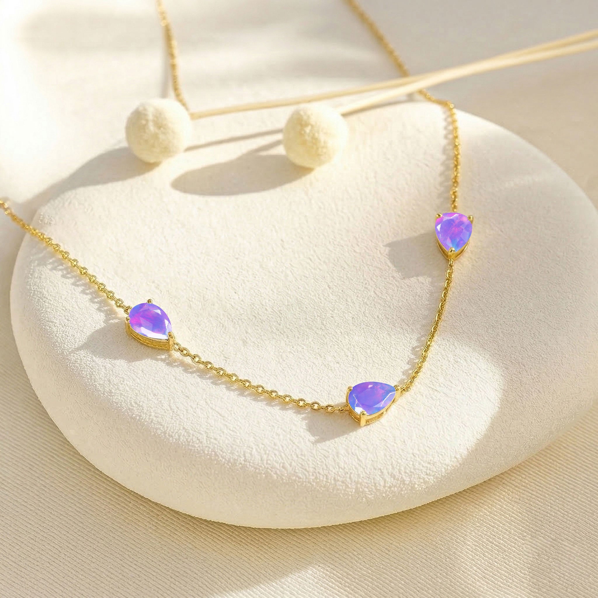 Yellow gold filled Lavender Opal necklace with three pear cut stones
