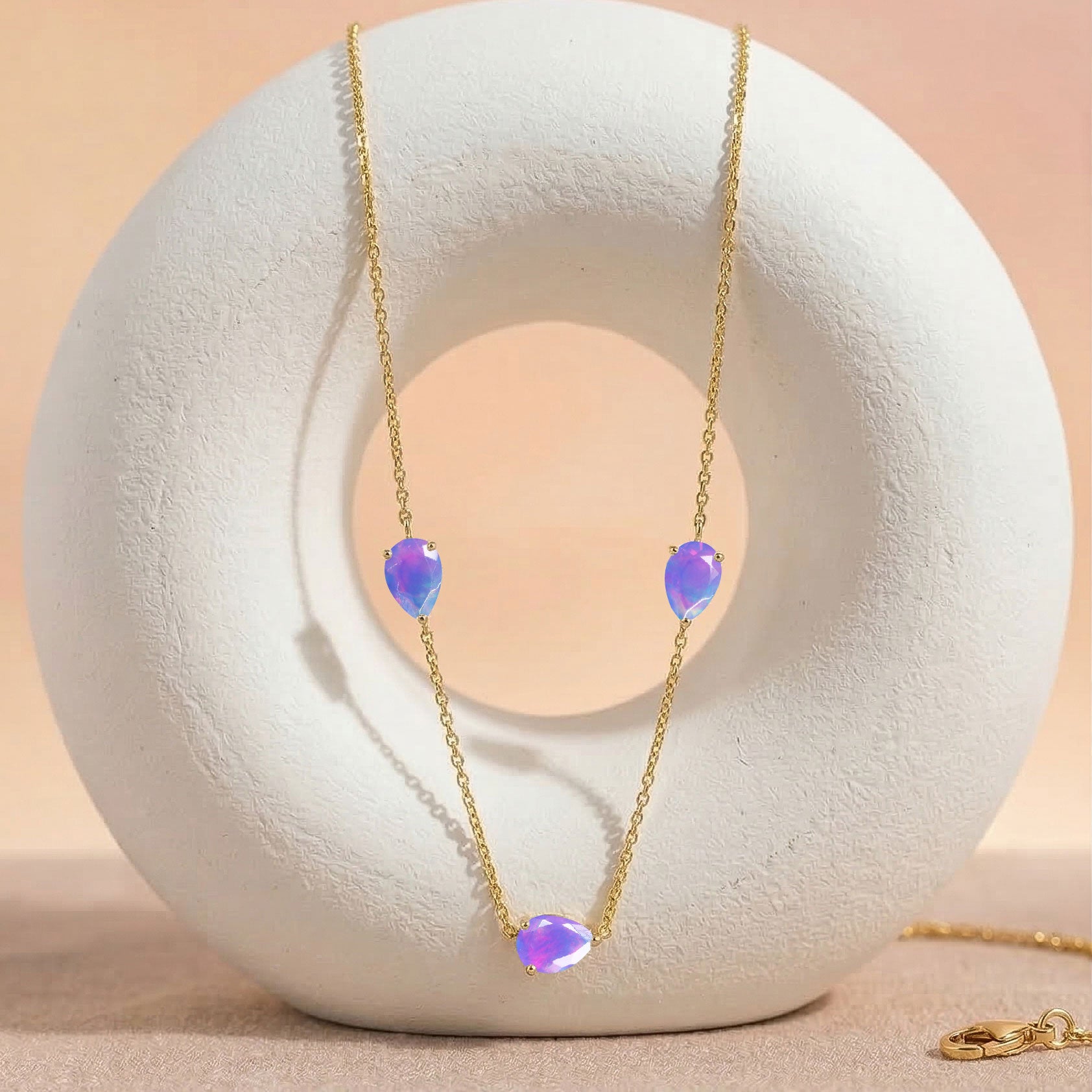 Close up of genuine Lavender Opal pear cut gemstones
