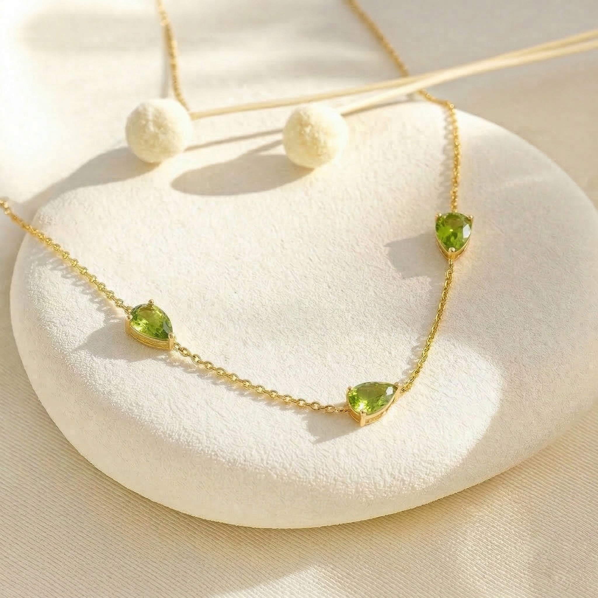 Yellow gold filled Peridot necklace with three pear cut stones
