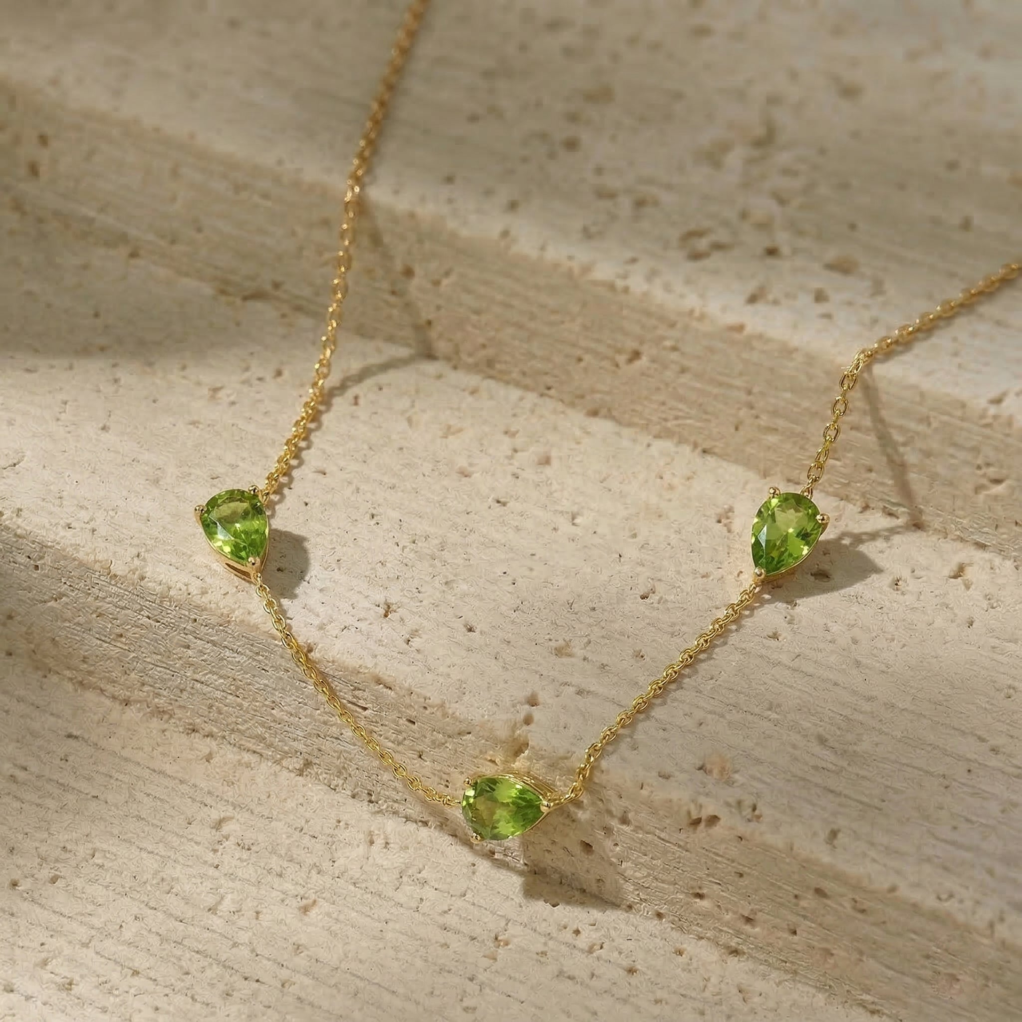 Fine jewelry Peridot necklace in sterling silver setting
