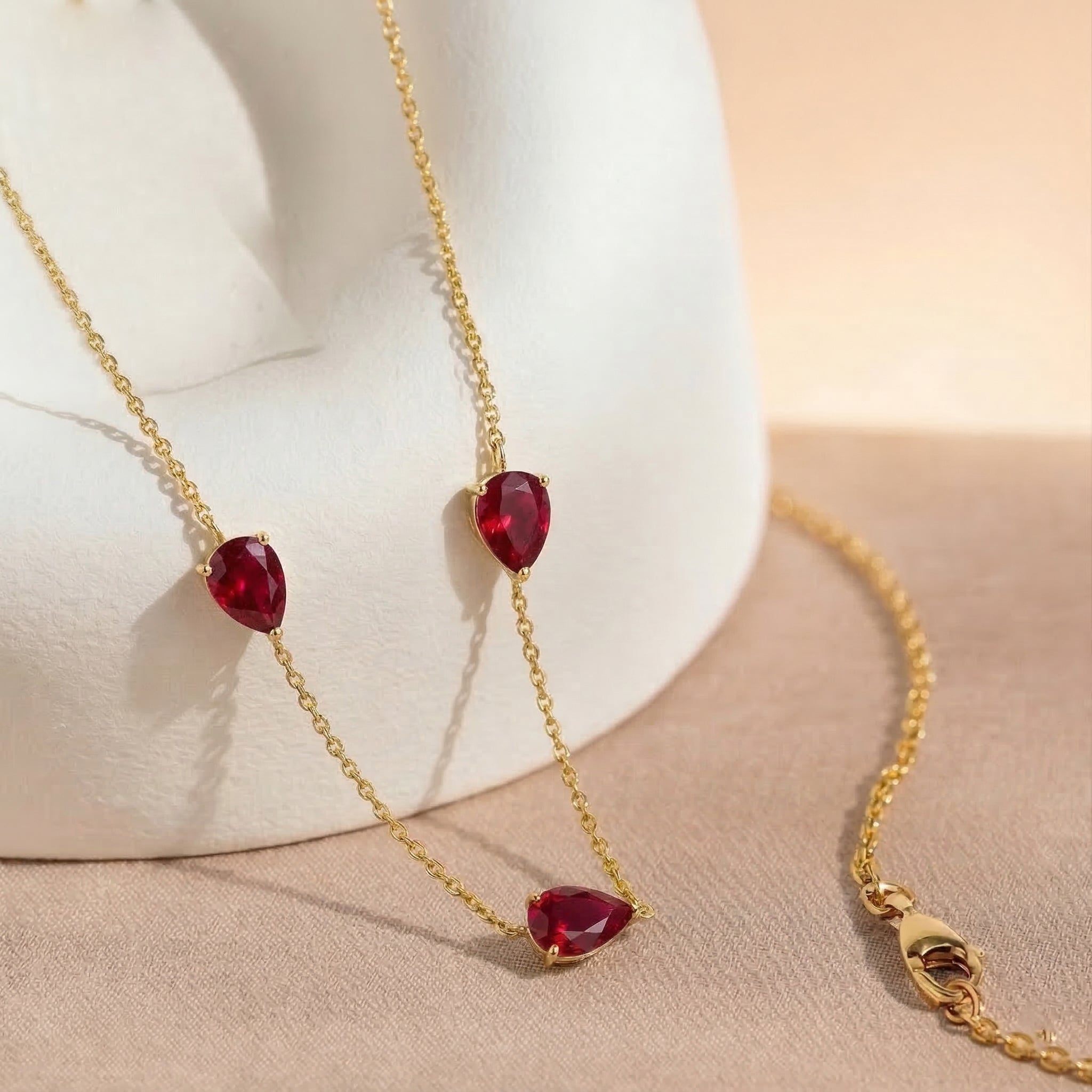 Premium pear shaped ruby gemstone pendant necklace designed as an elegant gift for women
