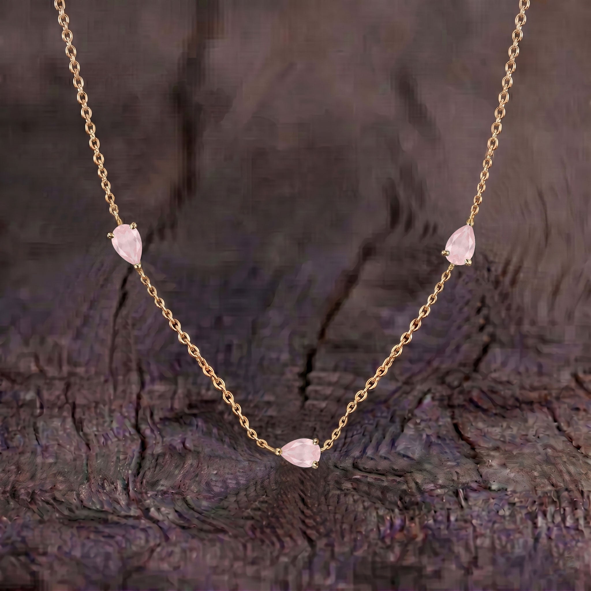 Fine jewelry rose quartz station necklace crafted in 925 sterling silver with yellow gold filled finish.

