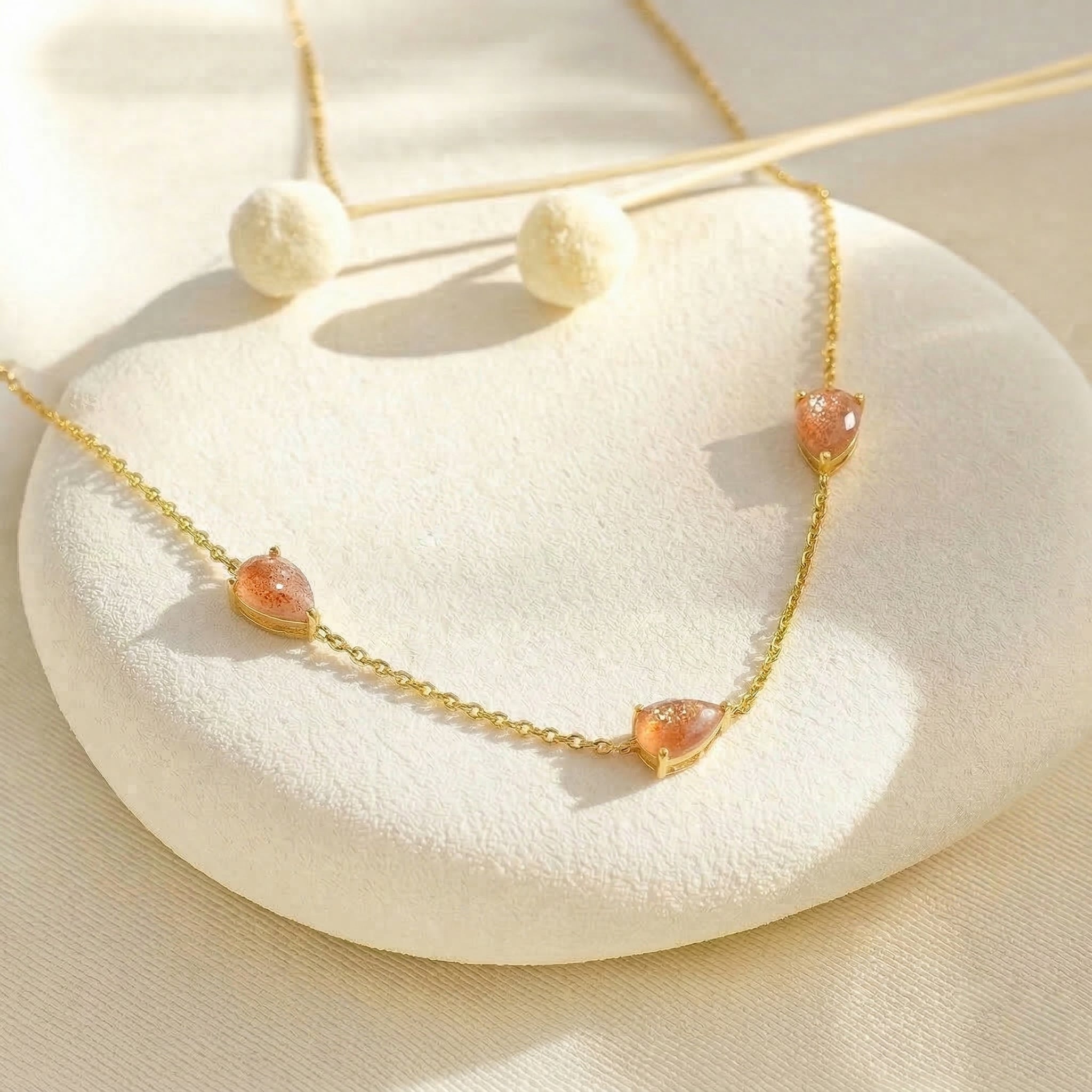 Elegant three stone Sunstone necklace symbolizing positivity, confidence, and joyful energy
