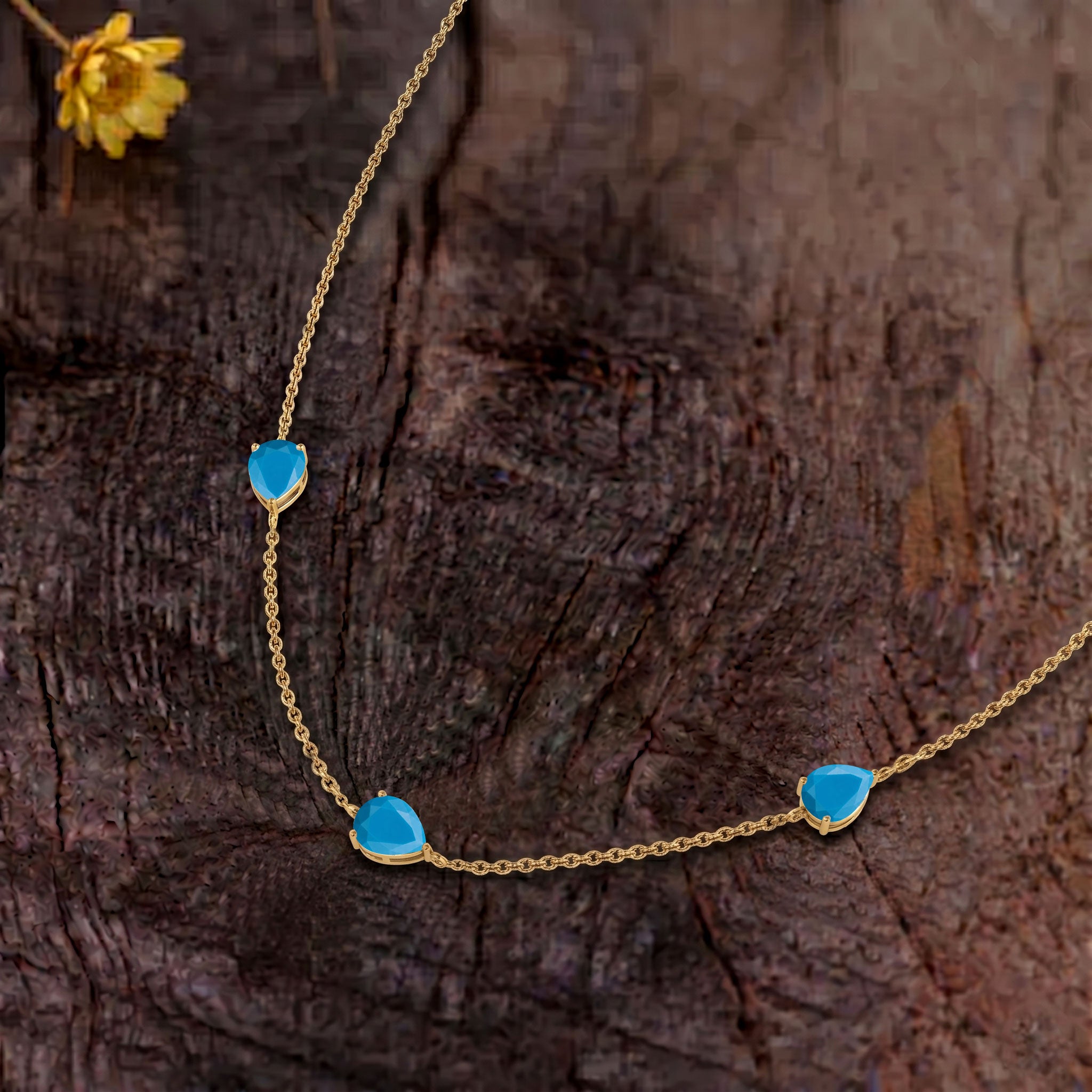 Premium turquoise birthstone necklace with pear cut gemstones and sophisticated jewelry setting for women
