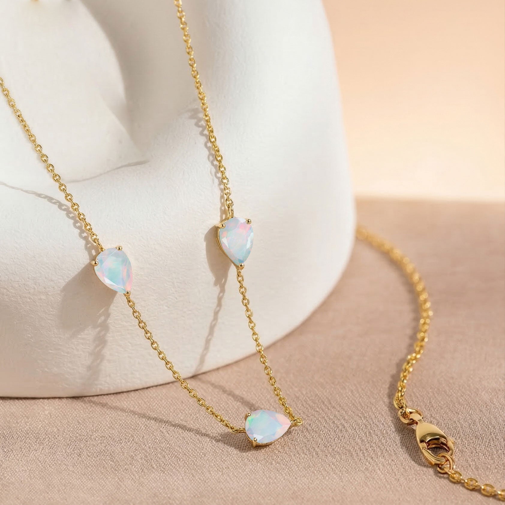 Elegant white opal pendant necklace designed as a meaningful gemstone gift for women
