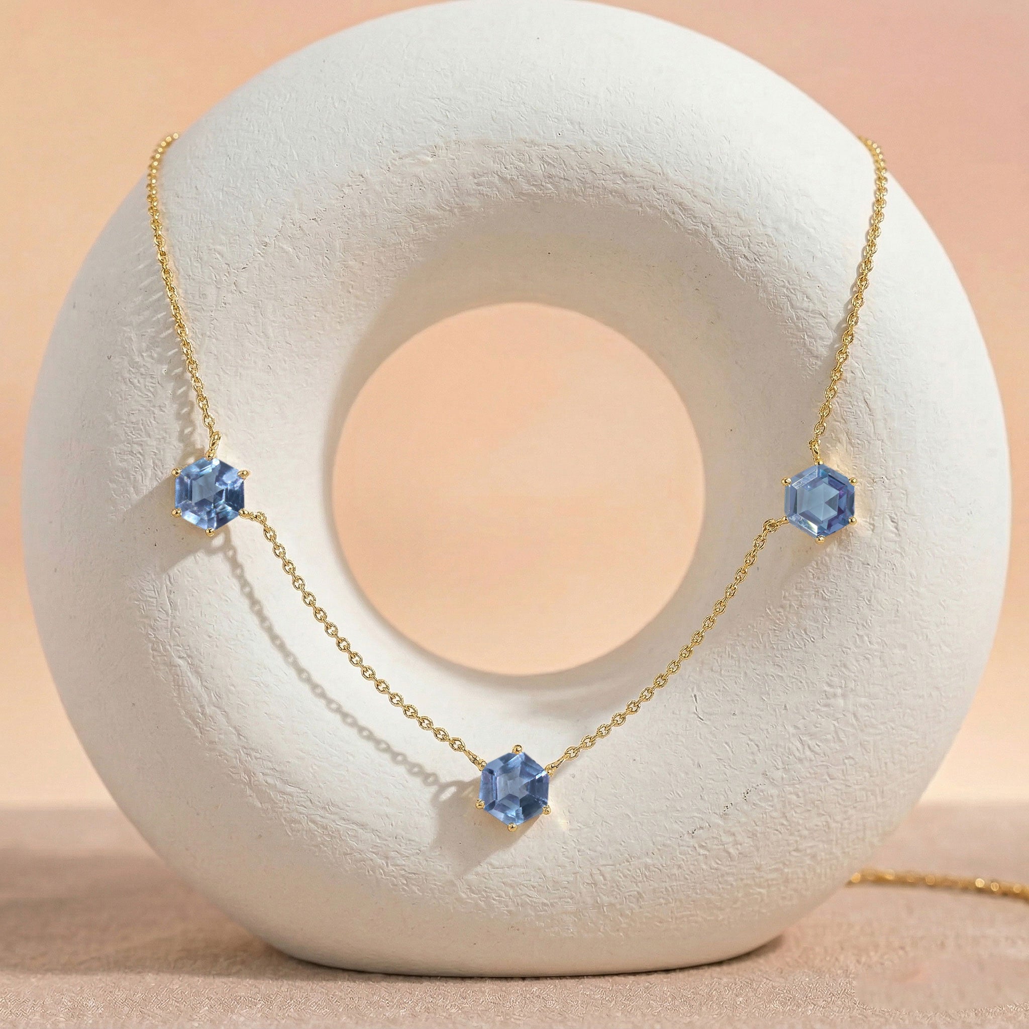 Elegant Alexandrite station necklace with gold filled finish.
