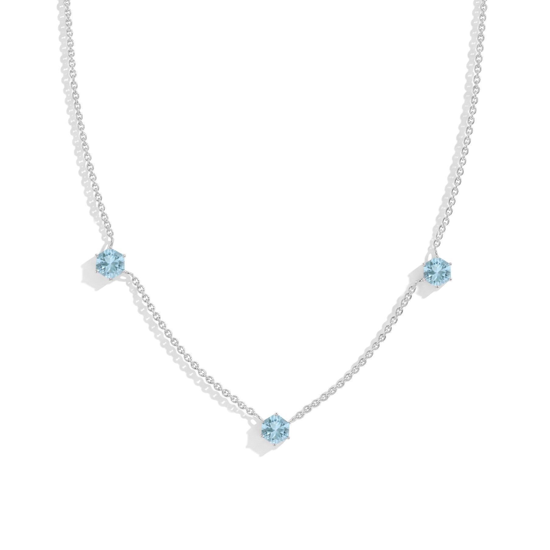 Dainty Aquamarine hexagon station necklace crafted in 925 sterling silver with three gemstone accents for elegant everyday jewelry styling.
