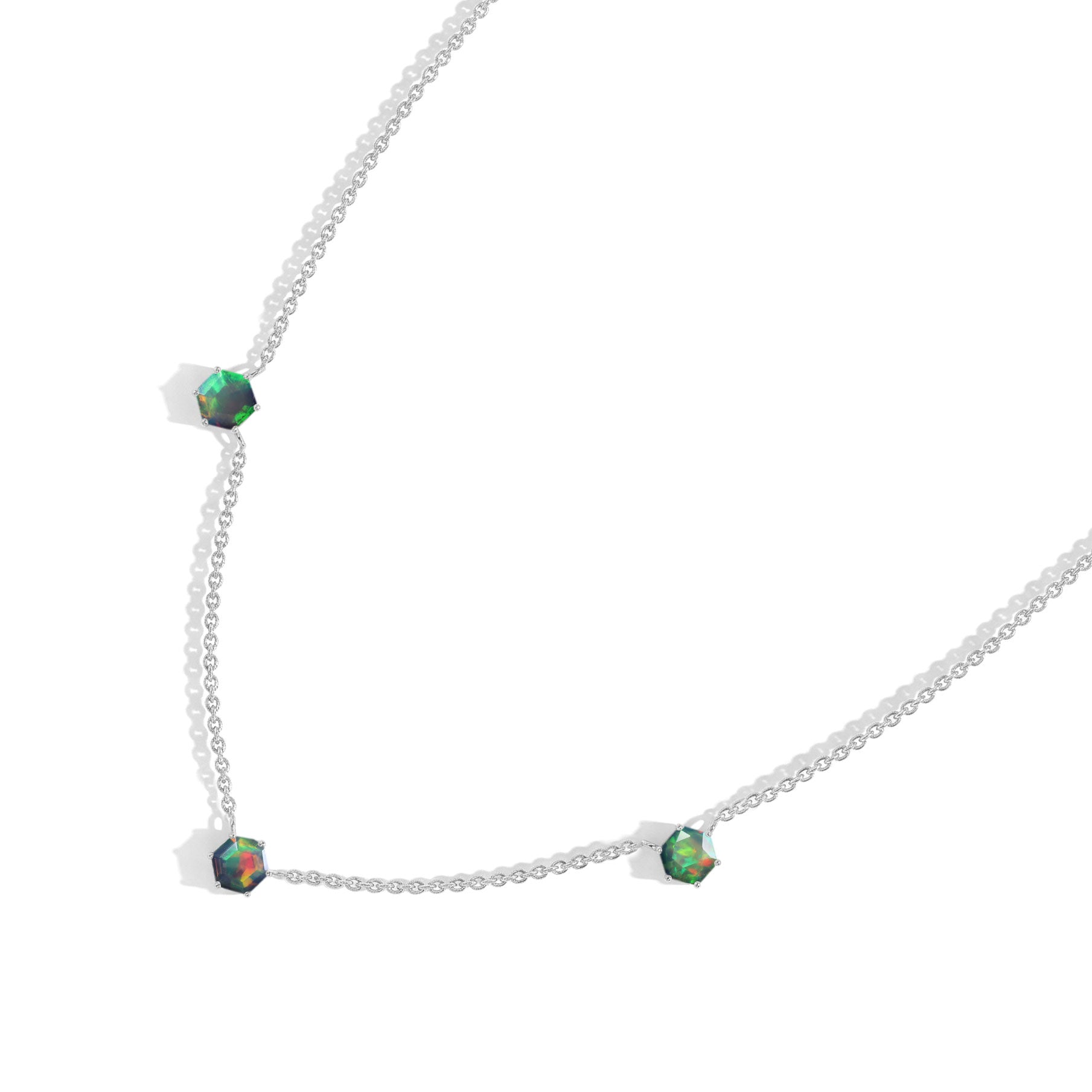 Elegant Black Opal hexagon station necklace with three genuine gemstones and adjustable 16 inch chain with 2 inch extender.
