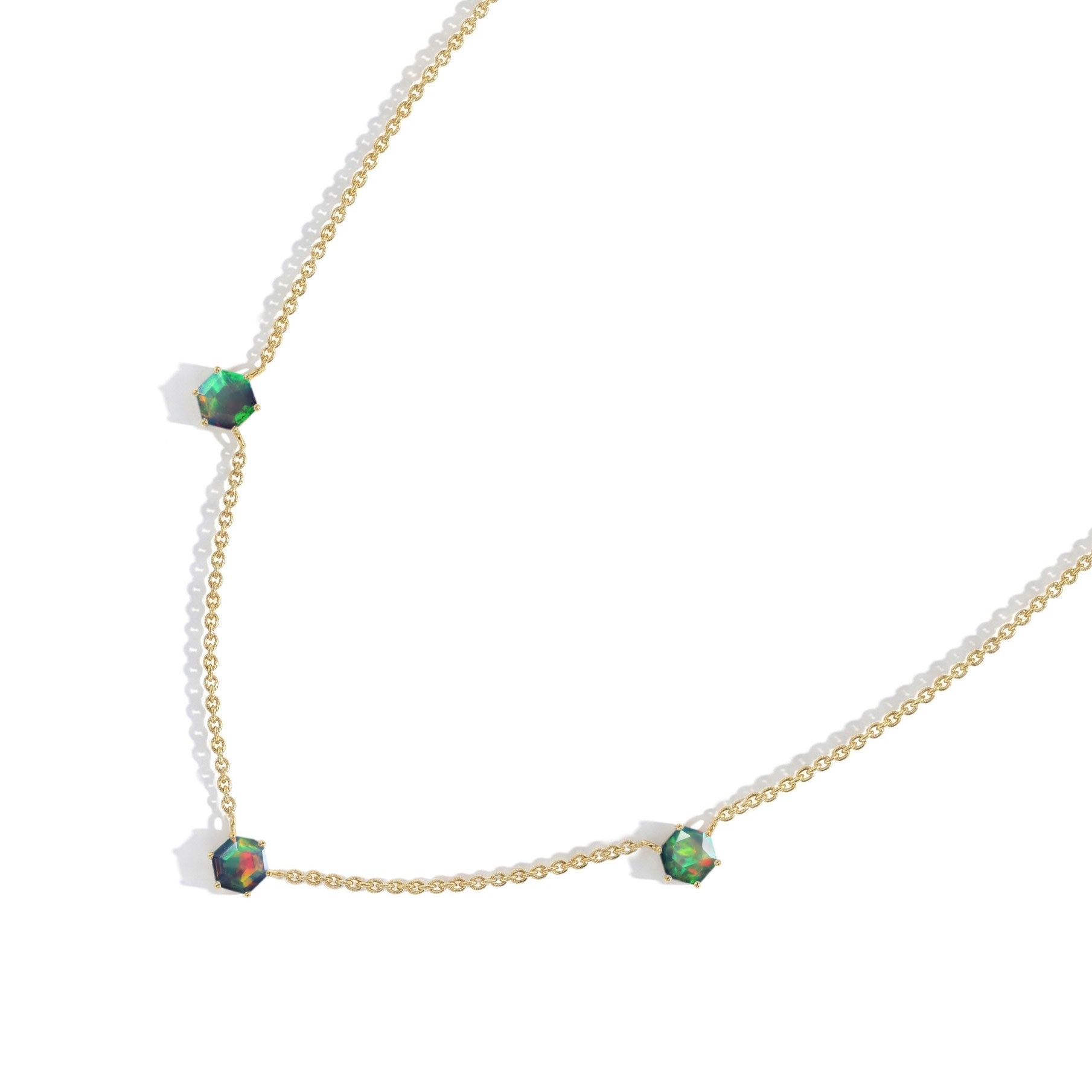 Black Opal gemstone necklace for women featuring a modern three stone station design in sterling silver.
