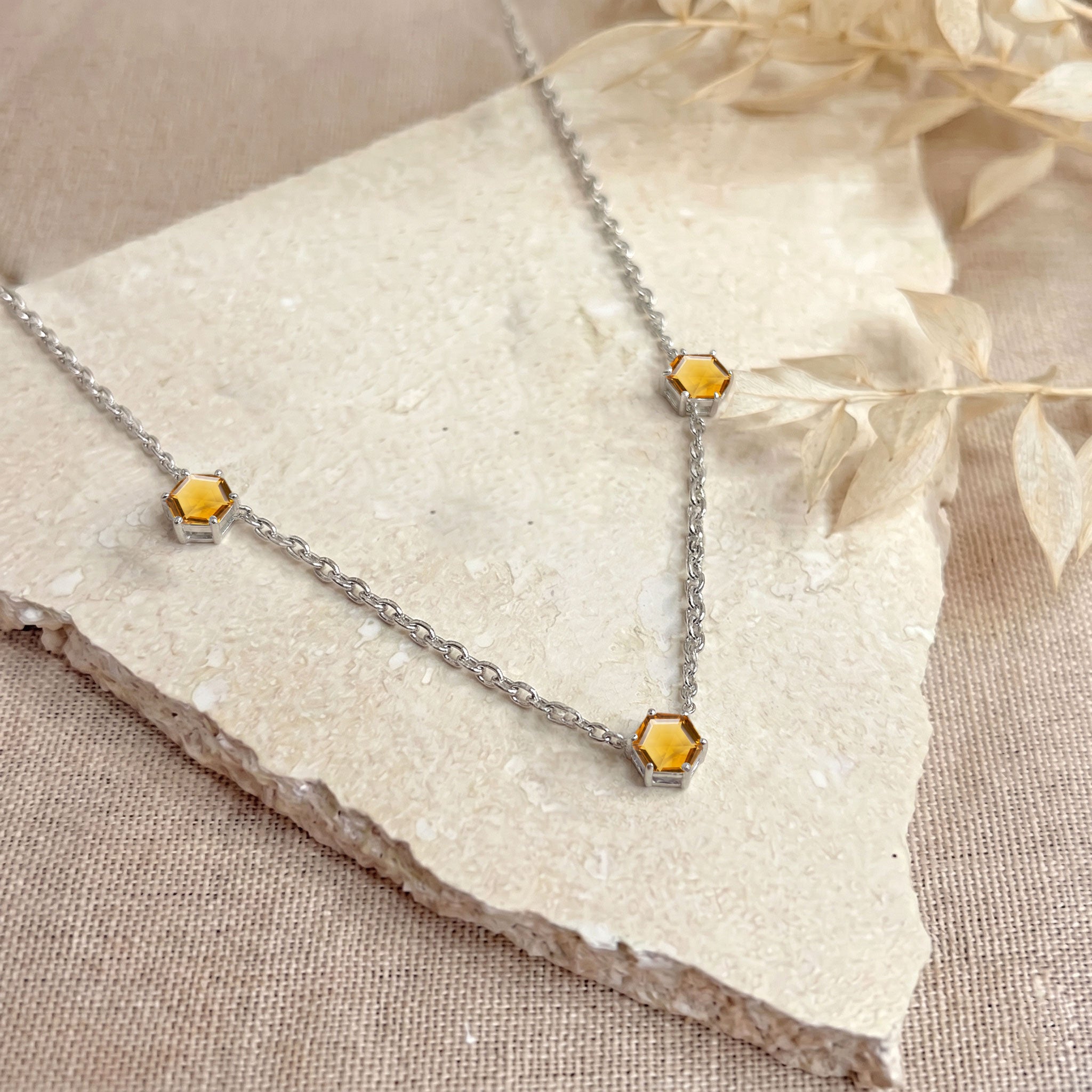 Citrine gemstone necklace for women with three stone hexagon cut jewelry details
