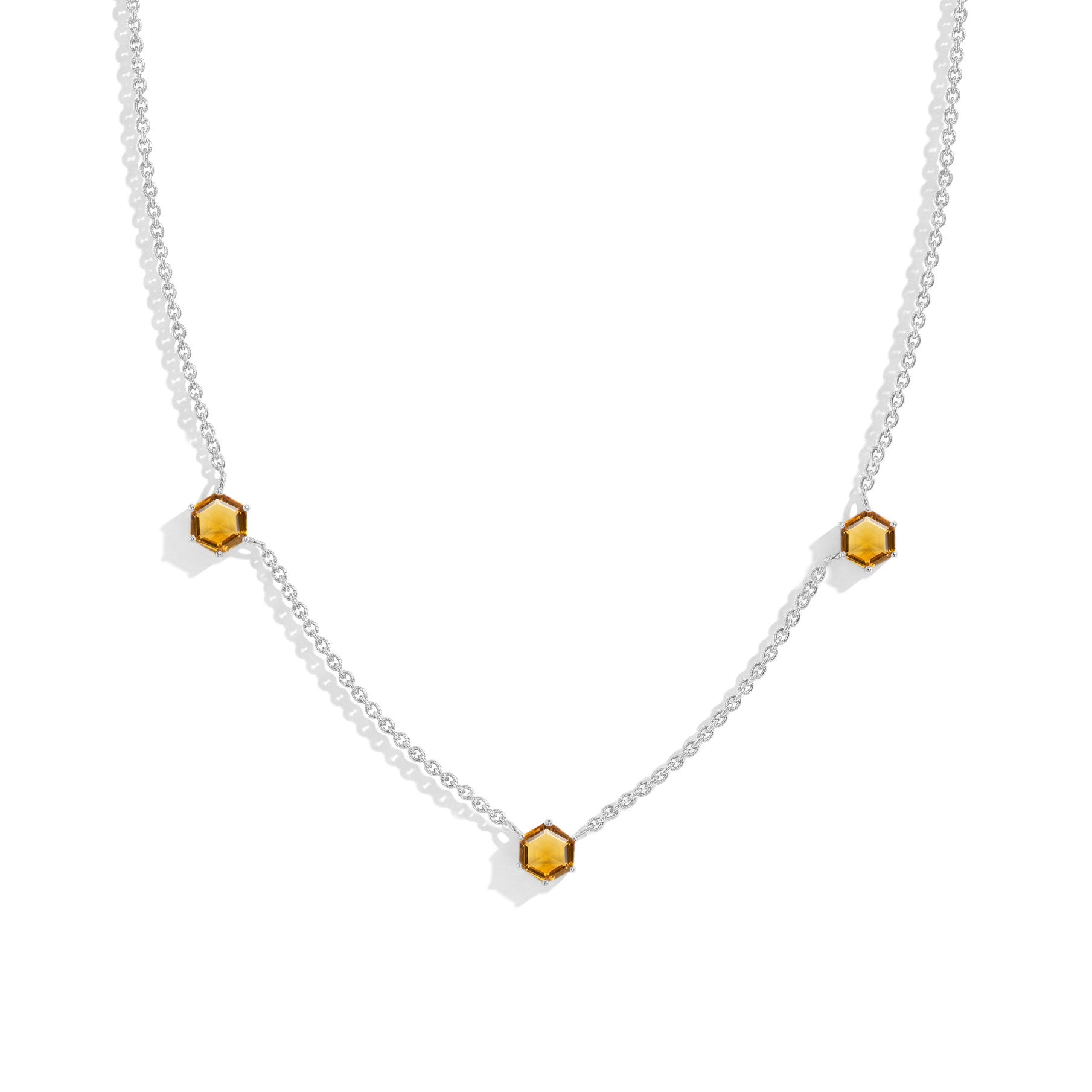 "Three stone citrine station necklace featuring hexagon cut gemstones in 925 sterling silver
