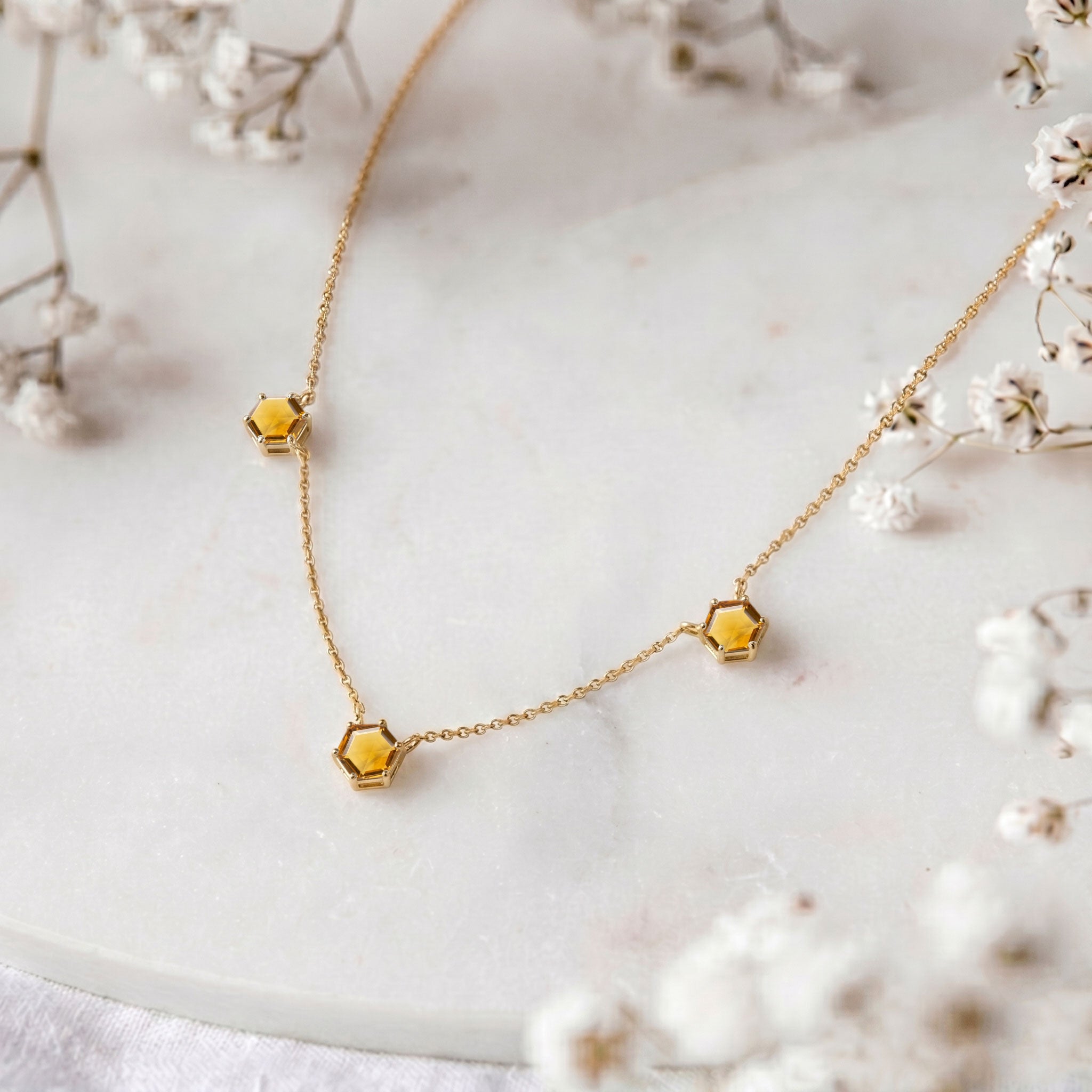 Yellow gold filled citrine three stone necklace with luxury gemstone settings
