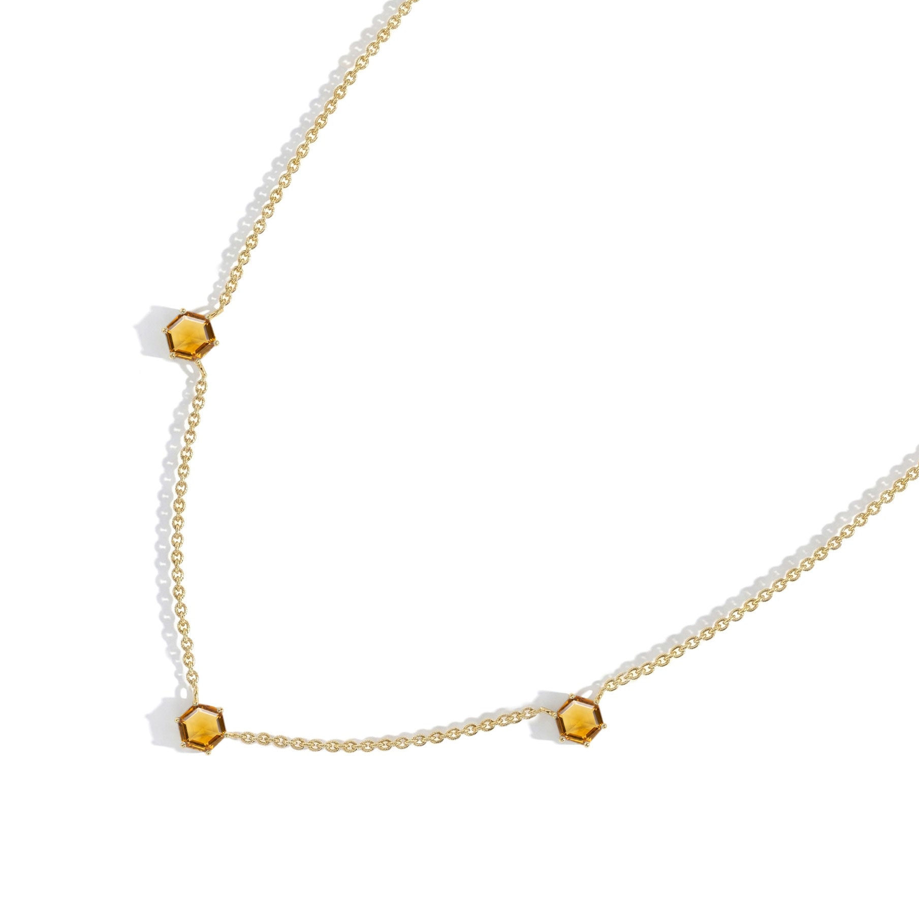Handmade citrine station necklace featuring elegant three gemstone arrangement
