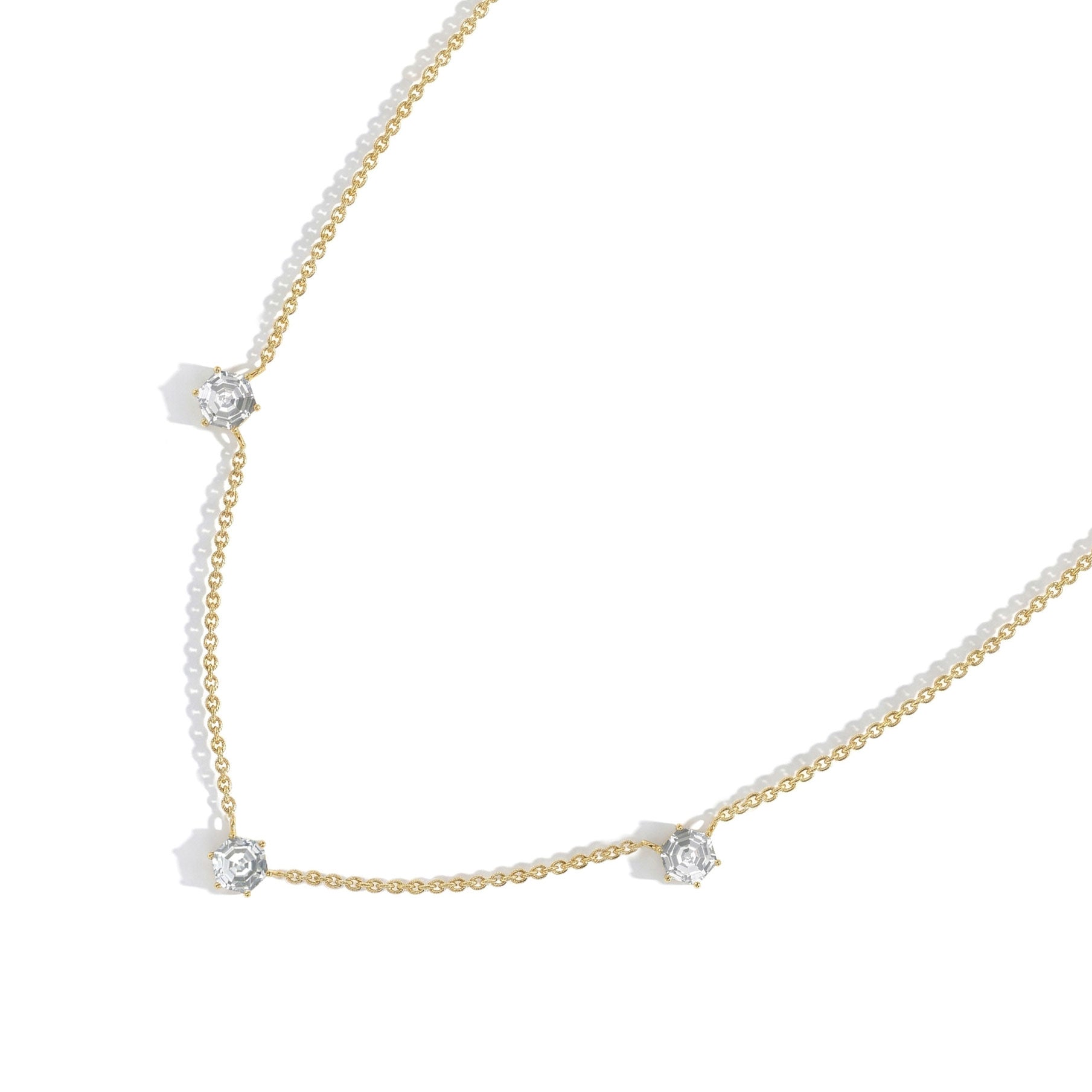 Fine jewelry Moissanite necklace featuring a three stone design with hexagon cut stones and premium sterling silver craftsmanship
