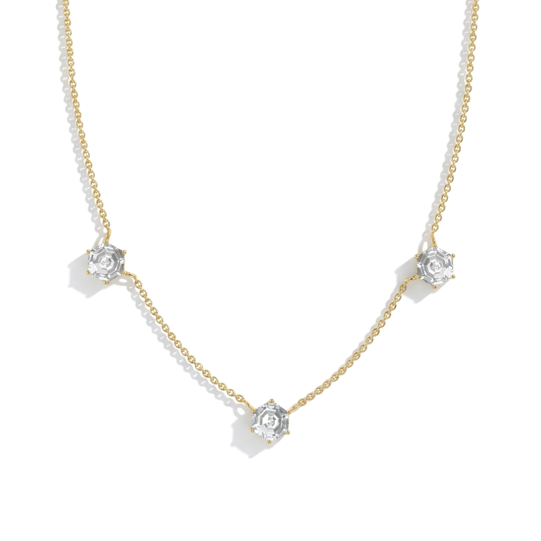 Women’s luxury Moissanite necklace with three sparkling hexagon cut stones, crafted in sterling silver and yellow gold filled metal
