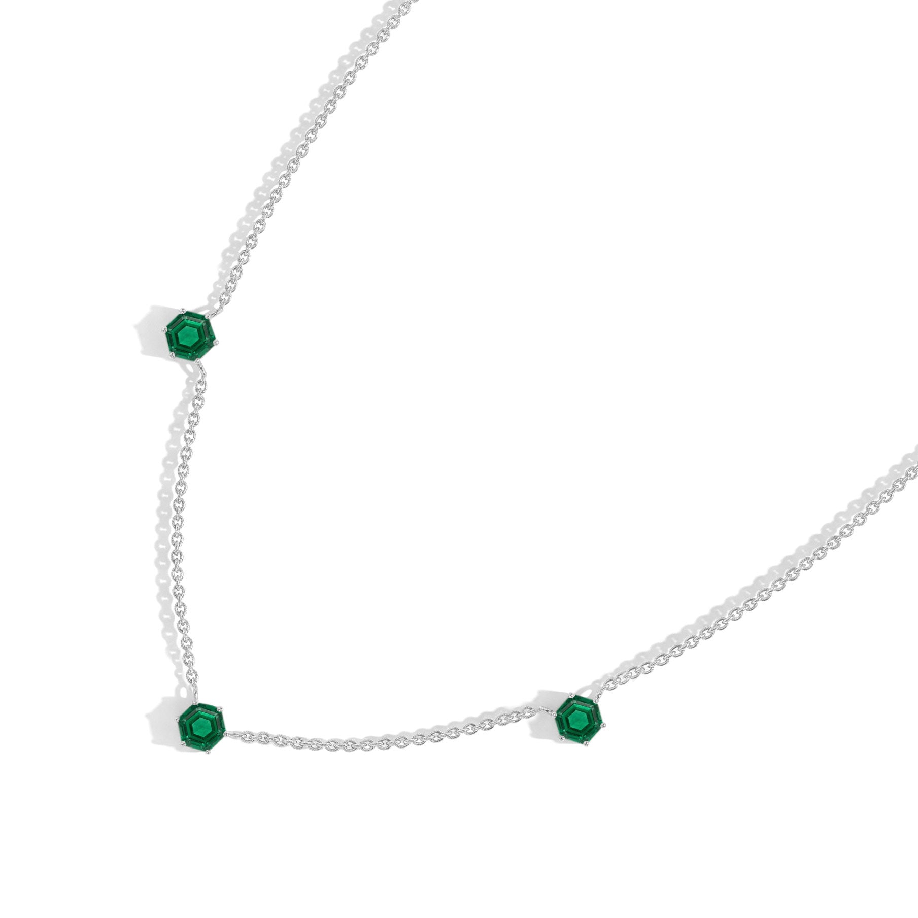 Fine Emerald jewelry necklace with three gemstone station design, perfect for layering or wearing on its own.
