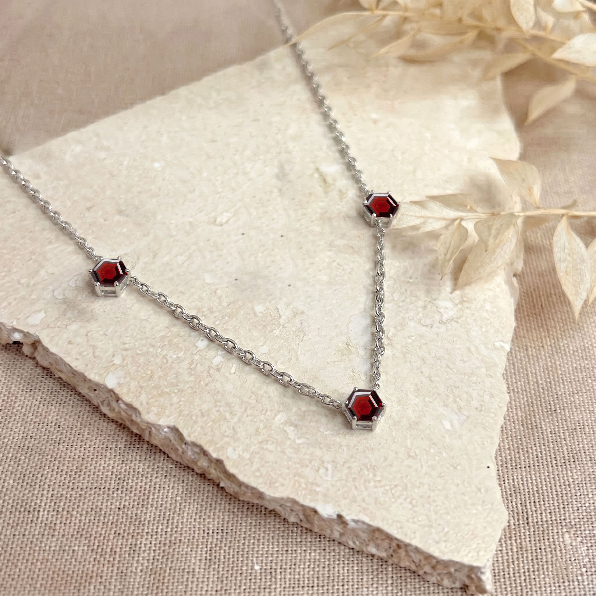January birthstone garnet necklace with three 6mm hexagon cut gemstones
