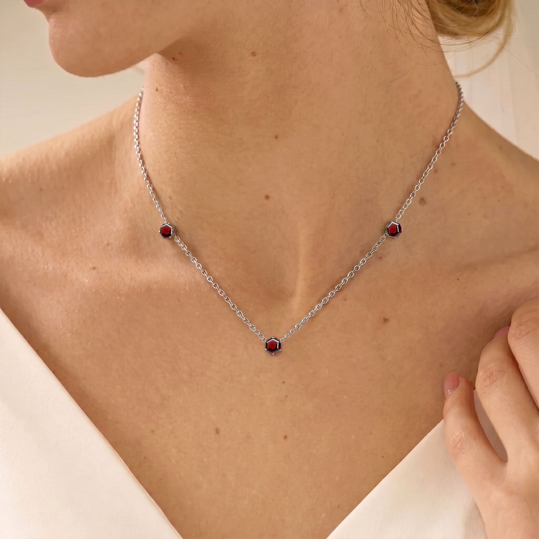 Red garnet three stone necklace crafted in 925 sterling silver with gold filled finish
