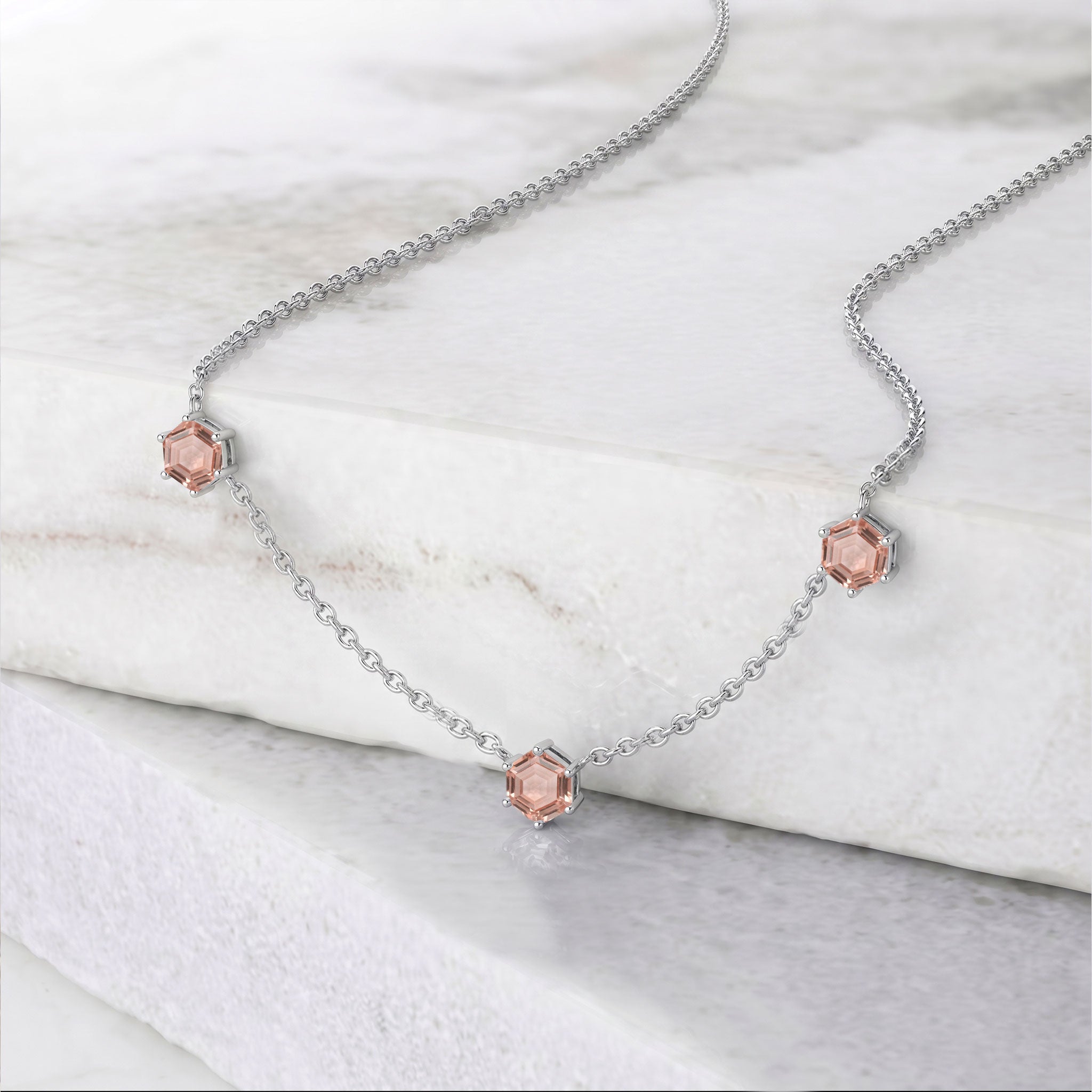 Morganite station necklace with three 6mm hexagon cut gemstones and adjustable chain extender
